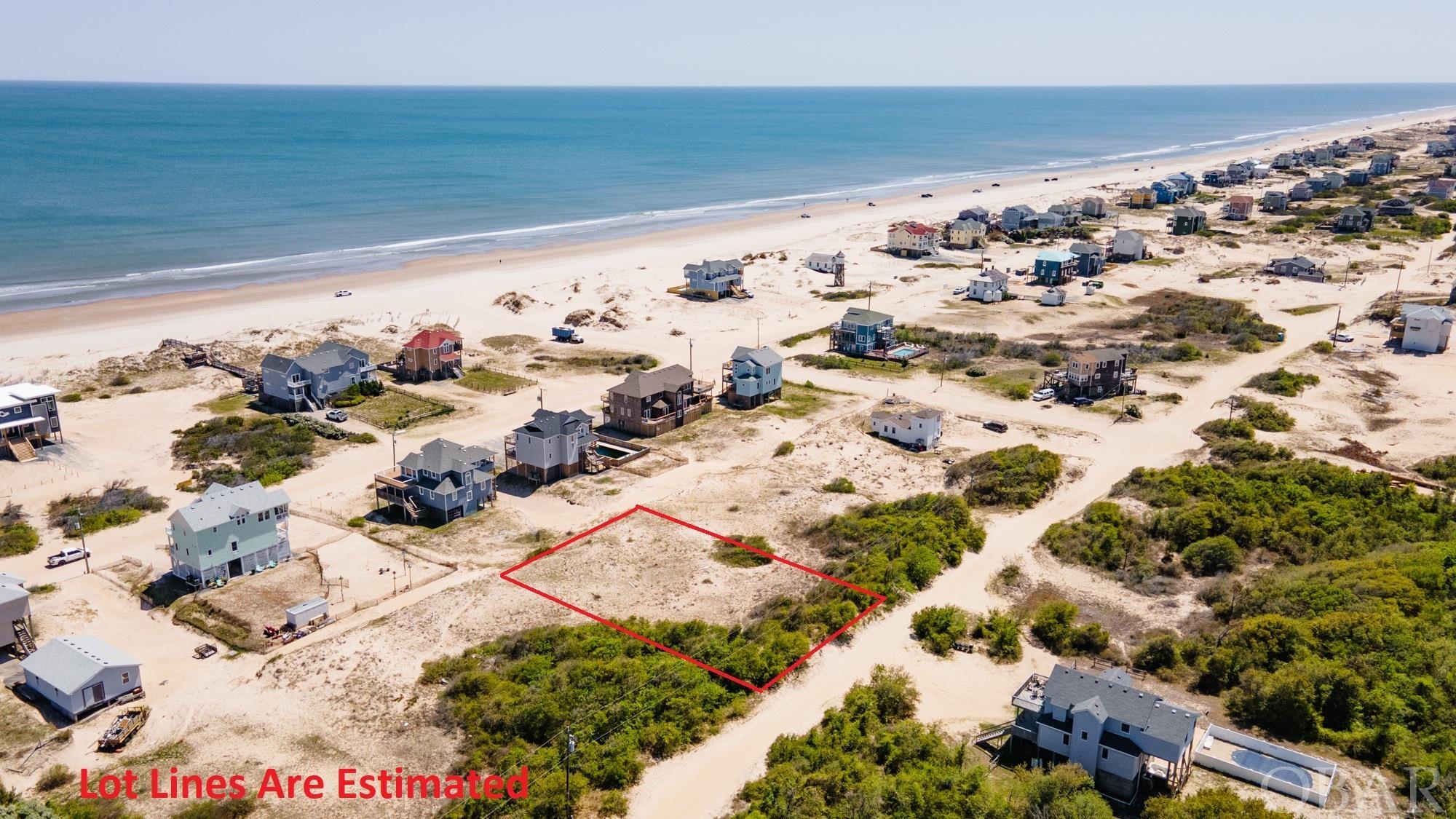 High elevation lot close to the beach!  The property is located on the third row back from ocean.  The access to the beach is close by, only three lots to the south.  While standing on ground level, the lot has peaks of ocean views.  A future home should have amazing views from the 2nd or 3rd level.  The property sits within the lower risk, flood X zone.  An excellent choice for a future beach house in the Corolla 4x4 area, where the wild horses roam.   Land Survey and soil evaluation were completed in 2019. Documents are available to view for those interested in the property.  Please ask for more details!