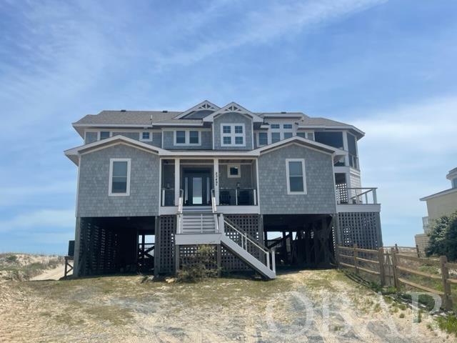 Remarkable custom home with amazing views on the Oceanfront in Carova Beach. Located in the X flood zone, this home has 5 BR/4.5 BA, NuCedar composite siding, Ipe decking with cable rails, engineered wood flooring and all high-end interior finishes.