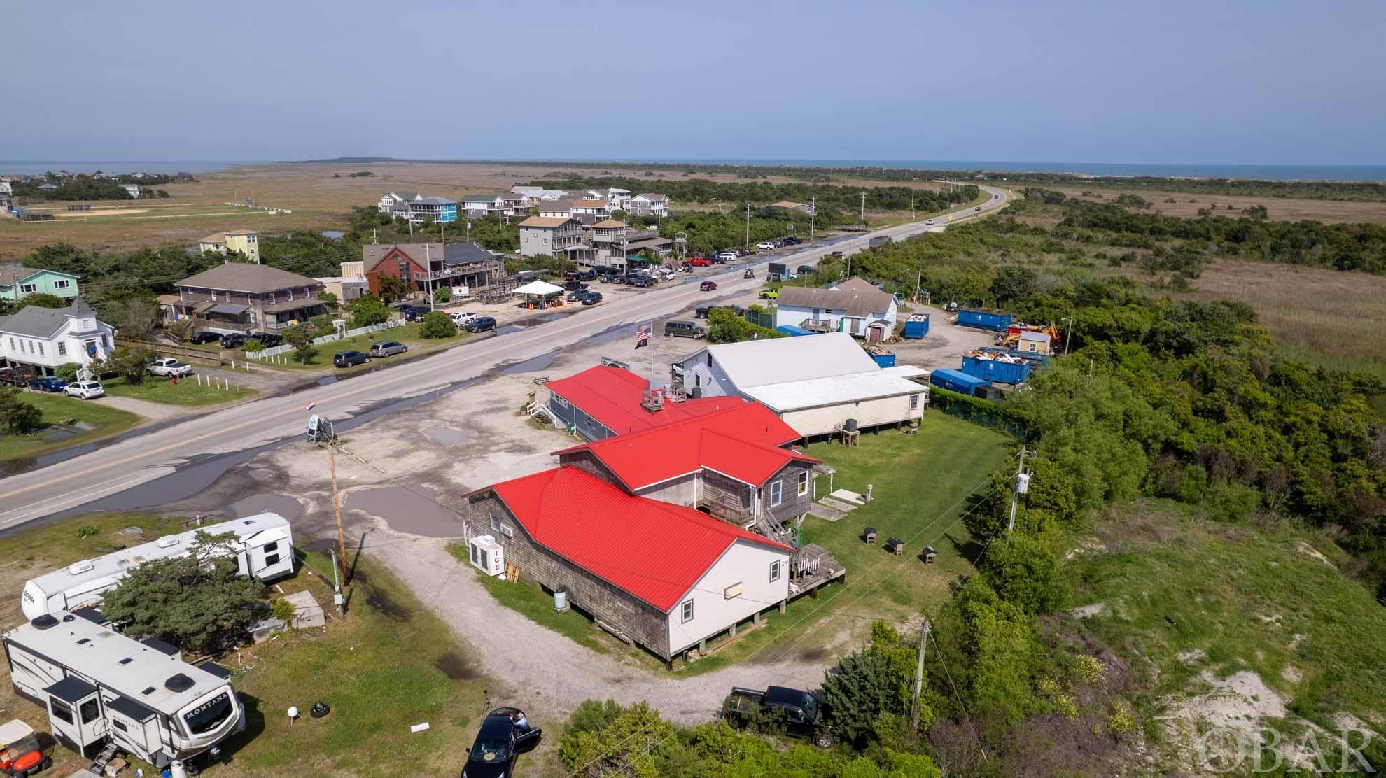 ESTABLISHED LONG TERM TACKLE SHOP AND APARTMENT Tradewinds Tackle has been the "Go To" tackle shop for decades. Conveniently located at the entrance to Ocracoke Village, with ample parking and all the supplies for a successful day of fishing, either by boat or on the beach. With little or no competition, excellent location, and with the long fishing season of Ocracoke, this is a great opportunity for the discerning buyer. The property includes a 1000 sqft apartment on the second level, that could be rented weekly, seasonally, for employees or as owner housing. This is a perfect situation to operate during the season, then spend winter in the Keys. Owner will help train and assist with transition. Jason's Restaurant  and the Tackle Shop have been recorded as condominiums for separation of the two properties and businesses. Taxes are not available yet. Additional information by request.
