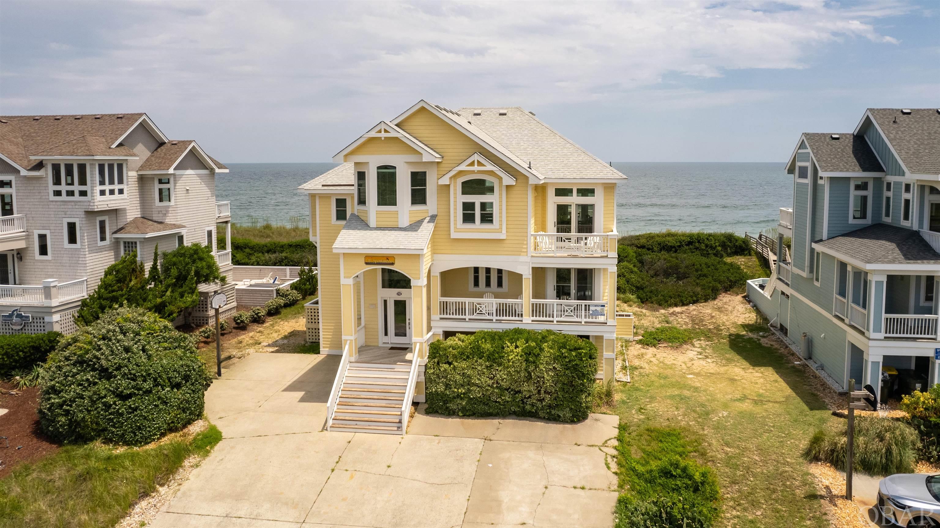This Pine Island oceanfront home is truly stunning!  Completely remodeled and upgraded in last few years.  This home features breathtaking water views of ocean and sound from any spot on the top floor.  The open living makes this top floor space your absolute favorite place to be.  Each bedroom has a style of its own.  The ground floor game room will be the place to be for indoor fun.  Spacious decking, luxurious 30x15 private pool, walkway to the wide open beaches for the outdoor activities.  This home truly has it all!  Top floor en suite for one floor living when it's just you.  Uniquely located with very few homes around so the beaches are sparsely populated.  Overlooks the sound for sunsets and wildlife viewing.  The home is well cared for and guests love it.  Quick access to Duck or Corolla as it's centrally located right between the two.  OB Spontaneous is a place you can truly let your cares go and enjoy the absolute best the Outer Banks has to offer!