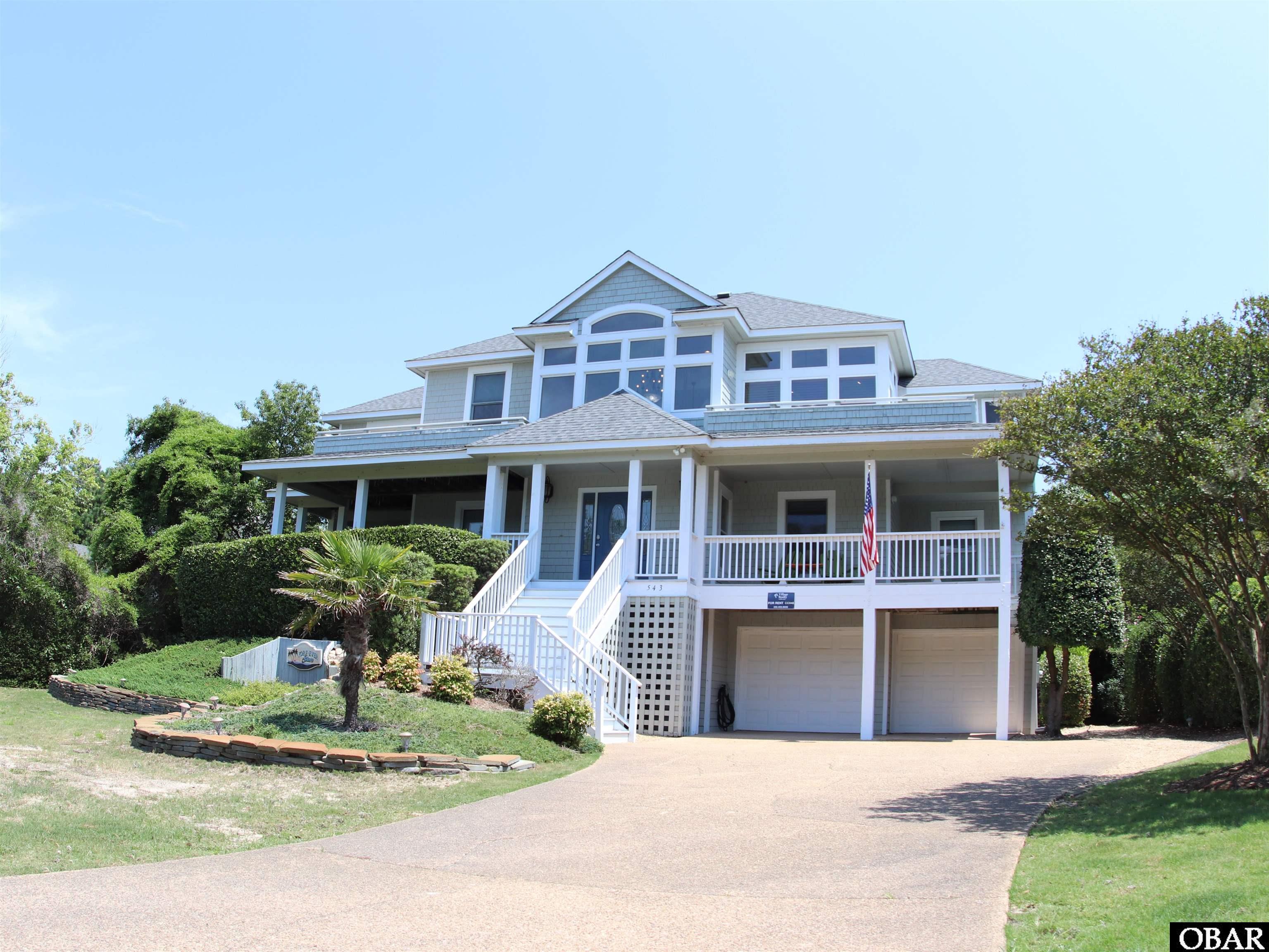 Currituck Club living at its finest!  This home located near the fifth tee has been well maintained.  Seller has completed a ton of updates over the last few years. It is now ready for years to come. Ask your Realtor for the update list.  It is also a great vacation renter just about completely booked May through September over the last three years.  Besides the great pool area and large entertainment room, there's over 1200 square feet of sun decks and 1300 square feet of covered decks for all kinds of Outer Banks activities. Relax in the hammock or watch the golfers on the fourth green. This location is conveniently located about equidistance from the beach and the club house.  You'll love this floor plan with great spots for entertaining and enjoying the Outer Banks.