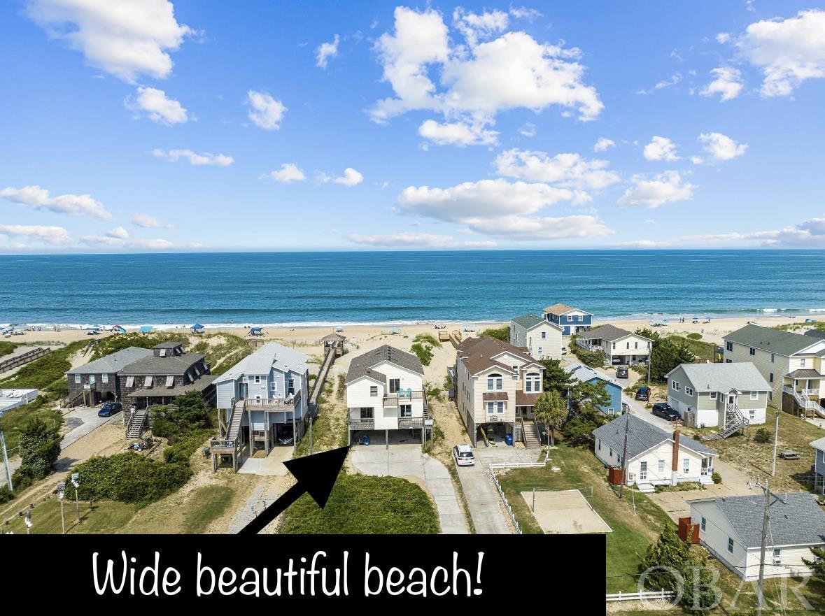 Imagine waking up hearing the waves and watching the sunrise over the ocean. This home has it all! See why renters return year after year (Rental Projection of $158,745). RECENTLY UPDATED BATHROOMS WITH TILE SHOWERS, TUB SURROUNDS, and NEW VANITIES. COMPLETELY REMODELED KITCHEN with quartz countertops, stainless steel appliances. Low maintenance luxury vinyl plank flooring throughout main living areas, NEW PLUMBING and NEW ROOF! Take a dip in the OCEANFRONT HEATED POOL or RELAX in the HOT TUB WITH STUNNING OCEAN VIEWS. South Nags Head is the best kept secret on the Outer Banks. Feel like you are away from everything while still being close to all the OBX has to offer. Enjoy a leisurely stroll to the Outer Banks Fishing Pier, home of the ever-popular Fish Heads Bar & Grill or drive just 5 minutes north to visit the numerous restaurants and shops. Copy and past link for a 3-D Virtual Tour https://my.matterport.com/show/?m=6goakcNKfwH&play=1&brand=0&mls=1&