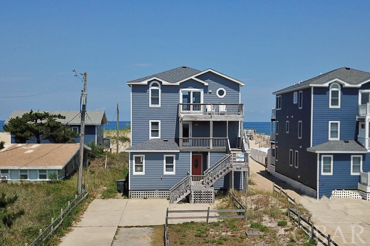 Fabulous chance to own the Oceanfront Beach House of your Dreams in the immensely popular area of South Nags Head.  With 2024 rents already up to $118K & projections showing as much as $245K possible….don’t miss out on this incredible investment opportunity.  The numerous updates done during the 22-23 off-season, include but are not limited to a new roof, all new sliding glass doors, appliances, ceiling fans, light fixtures and interior paint throughout.   Just south of one of the newer hot spot for locals and tourists alike, Fish heads  Bar & Grill/Outer Banks pier sit just to the North.  While an enjoyable hanging spot, it also represents one of the few businesses in this secluded area of the central beaches.  Long have our beaches attracted visitors due to our more private, less crowded beach scene with overly commercialized areas of the beach few and far between.  South Nags Head gives vibes of the Old Outer Banks, where the renourished beaches allow for a relaxed beach experience.  Honestly, how it used to be and what made the OBX so famous/popular.  This home represents the family home or vacation rental that allows for one to experience the old Outer Banks but with certain level of style and luxury.   All of that said, SNH marks one of the major junctions of our island.  Visitors can go North to Kitty Hawk/Corolla, South to Hatteras Island and even west to Roanoke Island.  Perfect for those that like to chill out during the day but have the option of heading out. Sunrises in the morning and sunsets in the evening, picturesque in every way.  Set your showing today