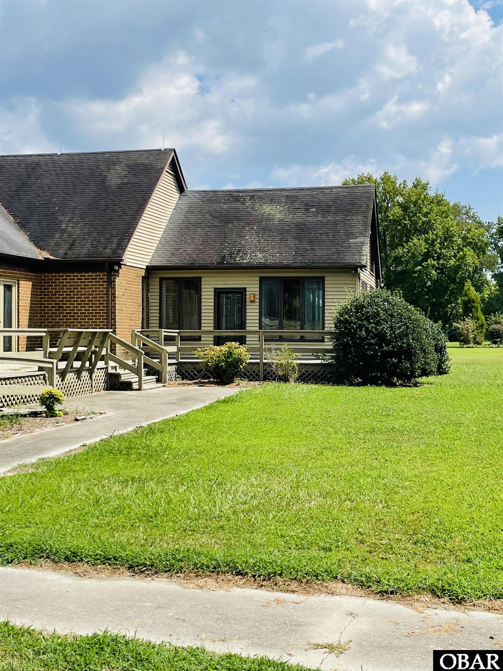 With hot tub and bar just off deck! Party central overlooking the river/water/sunsets!