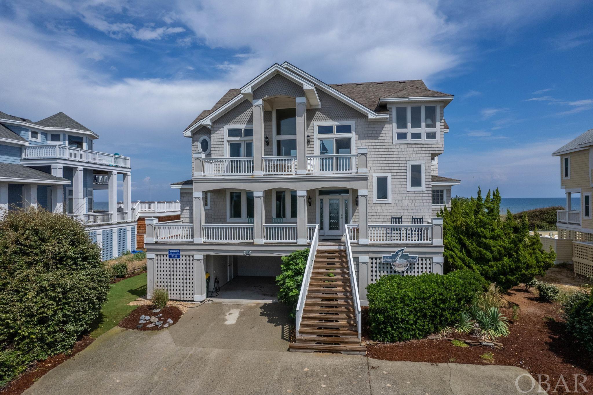 Gorgeous Oceanfront in one of most unique areas of Pine Island.  Ocean and Sounds views and practically private beaches await you at this 6 Bedroom, 5.5 Bath oceanfront retreat.  Ground floor has 3 bedrooms, 2 baths and generous game room with pool table and arcade, along with the laundry room.  Second floor has 3 spacious primary suites, two of which have ocean views.  You also have a main foyer and sitting area with ocean views and covered porches.  The main living area is all open kitchen, dining and living room with wet bar and ships watch.  The views from here are all water--spectacular!