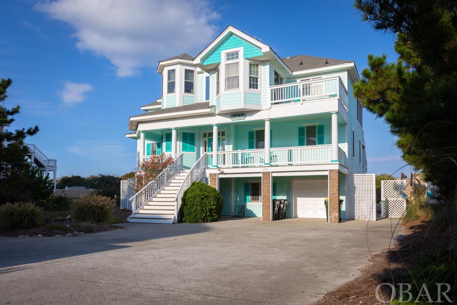 "Orchid Isle" is a premier TIER 1 OCEANFRONT 6bed/5.5bath FULLY-FURNISHED active rental w/PRIVATE OCEANSIDE POOL in BEAUTIFUL BUCK ISLAND! A grand home in a grand location. Since late Jan 2020 seller has made many recent big-ticket quality upgrades, including NEW ROOF installed Sept 14, 2023. ALSO NEW exterior PAINT; before painting, all necessary SIDING/TRIM was replaced; many WINDOWS were replaced including HUGE top-level oceanside picture windows, den SLIDER and surrounding WALLS in living area and ENSUITE KING bedroom...so you can AWAKE TO WAVES ON THE BEACH! Seller also replaced/upgraded POOL lip/edge with travertine, and installed NEW larger POOL PUMP/FILTER. Installed ALL NEW COMPOSITE TOP and MID-LEVEL DECKING & STAIR TREADS. Moved HOT TUB to pool area for wider usage of it and the expansive MID-LEVEL COVERED DECK. Built separate 8x7 lockable OWNER'S STORAGE in rear of garage (still plenty of garage space for bikes, beach toys, etc.). OUTDOOR SHOWER was upgraded and LANDSCAPING was redone. Large rooms and THREE KING ENSUITES. Victorian-inspired covered FRONT ROCKING PORCH; in rear, all oceanside decks lead down to pool and dune beach walkover! Buck Island is a planned development with fantastic private amenities, accessed by a securely-gated entrance, down a winding lit, tree-lined street with turtle ponds dotted alongside. Shared dune walkover with only one neighbor, at southernmost end for more private-feeling beach relaxation. INCOME CAN BE HIGHER--seller limits open weeks to only June, July & August AND takes personal in-season weeks (totaling approx $10k each year in 2021 & 2022, and about $23k in 2023). See TWO nearly identical Professional local management projections on file--estimates for $186,000+ gross if calendar is expanded!