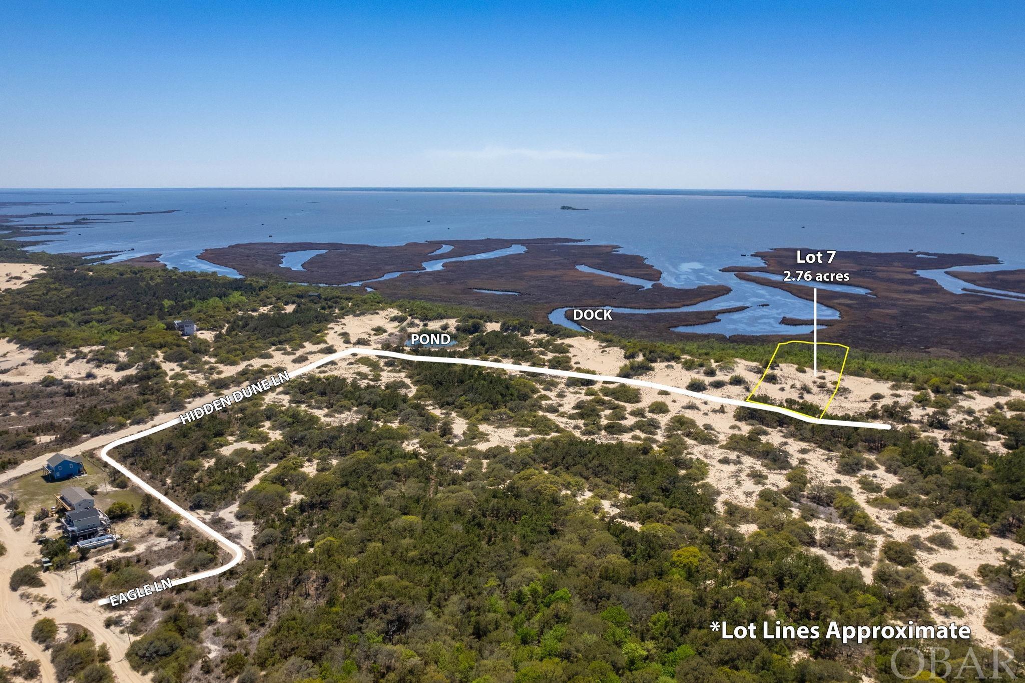 Discover the perfect opportunity to build your dream home on Lot 7 of the coveted Hidden Dunes Estate in the four-wheel-drive area of Corolla. This lot is wide and spacious, offering ample room for your new construction home.  Located in a private community, this lot offers easy access to the community dock for sound access, perfect for kayaking, boating, and more! You'll also enjoy stunning ocean to sound views from this location.  Imagine designing and building your own custom home on this homesite, perfectly tailored to your preferences and lifestyle. This location offers a peaceful retreat from the hustle and bustle of everyday life, with easy access to community amenities and the beach just a short distance away.  Don't miss out on this unique opportunity to own a piece of paradise in one of the most desirable areas of Corolla. Schedule a tour of this exceptional property and start envisioning your dream home in the tranquil surroundings of Hidden Dunes Estate.