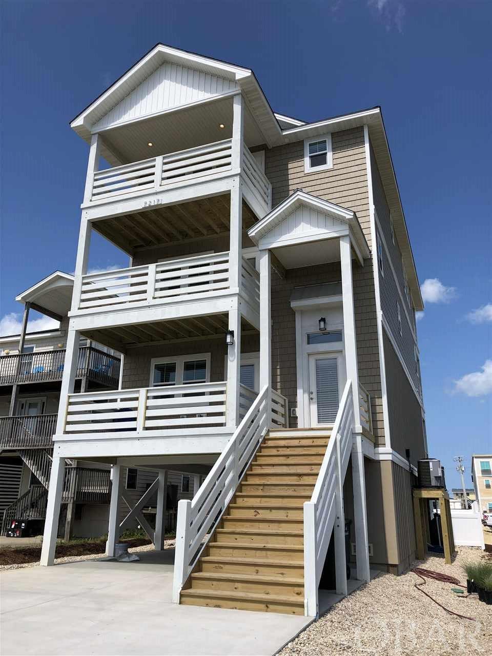 Newer construction, built in 2018. Ocean & Sound Views. Location, Location, Location. All rooms have beautiful views of ocean or sound. 2 min walk to restaurants, market, and beach.   Elevator, Swimming pool. Game room, large bedrooms. Top floor is open kitchen, living, dining, with covered porches on east and west side. Watch sunrise from ocean then sunset into sound. Bedrooms have beautiful ocean and sound views. No details missed in furnishings, house furnishings and layout.    See across sound to Pirates Cove, and Sugar Creek. One lot back from two beach access (Grey Eagle & Jennette's Pier). 2 minute walk to Jennette's Pier, Sam & Omies Restaurant, Cahoons General Store, Dune Burger, Fat Boyz Ice Cream & Grill. Close to restaurants: Lone Cedar, Owens, Sugar Creek, Outlet Mall. Top rental producer, something for everyone. Great for families & guests attending events at Jennette's Pier. Altogether the combination necessary for strong vacation rentals every month of the year.