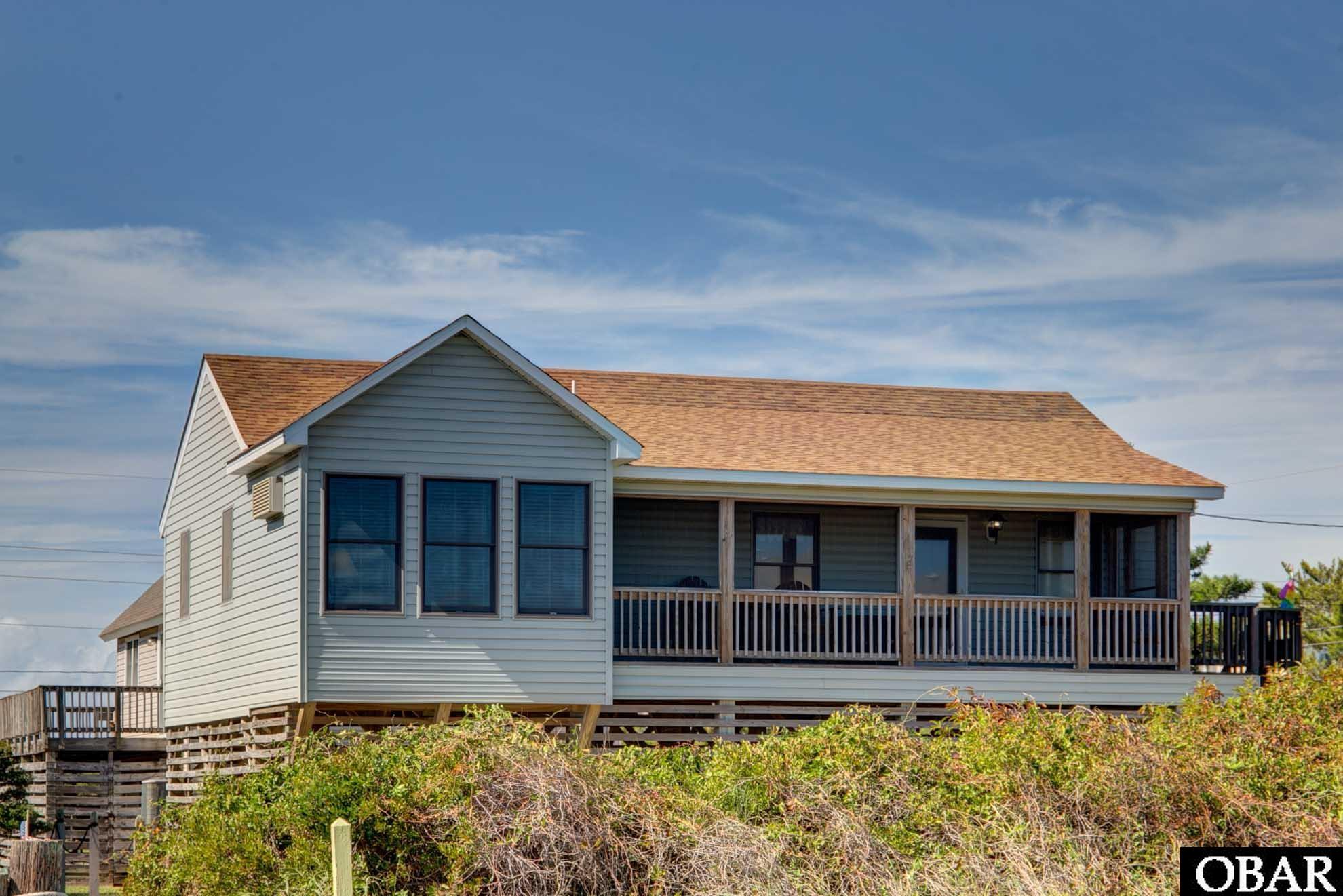 The attention to maintenance is apparent the minute you pull up to this home. Nestled on quiet Inlet Court in South Nags Head, this home offers the ease of single-level living, a 5m walk to the beach and the charm of the Outer Banks that so many know and love. Extensive records are available and Sellers have used this only as a second home for many years, eliminating the daily wear & tear often found in a primary residence. MAJOR PLUS(ES): Thanks to a thoughtful addition, the potential to create a separate "suite" with private exterior entrance and half bath could offer privacy to guests or multi-family vacationers AND(!) Cedar Homes Colony includes use of a private beach access, ensuring your commute to the sand only requires a few steps!