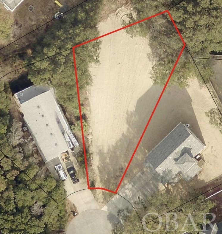 Cleared, Filled and Water Tap paid! Over 9' elevation on a flat lot. Ready to build. This is a great lot for a starter home or a builder spec home. Nice buffer in the back with the property owners association land. Great location with an easy walk to the sound and bike path.