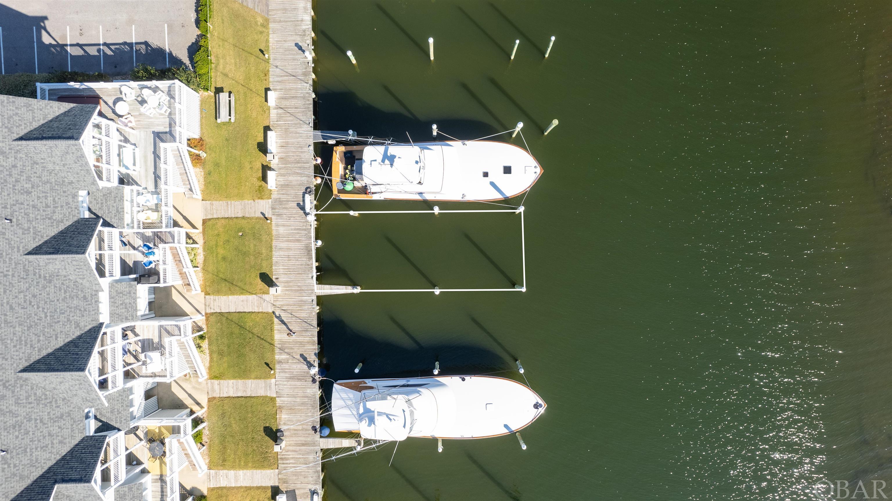 65x 20 foot boat slip on F Dock (can accommodate a 70 foot boat). Convenient to parking and close to fish cleaning station. Pirate's Cove Offers in slip diesel fueling.  Walk to the ships Store, tiki hut or Bluewater Restaurant.  Condo 203 Sailfish Drive is also for sale MLS#
