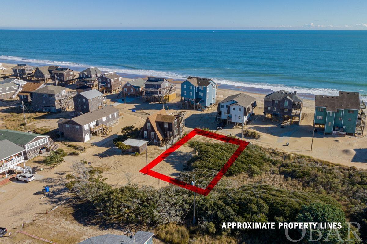Discover your future dream home on this semi-oceanfront lot located on a quiet street in the beautiful Buxton, NC. This unique opportunity offers you a ready-to-build site with all necessary work completed, including a valid septic permit, CAMA permit, a detailed site plan, and attractive house plans. Just a short walk from the beach, this location promises potential for amazing sunrise views, adding to the allure of your future home. Buxton, NC, is not just about the serene beachside living; it's a place where local charm meets modern convenience, offering a lifestyle that's both tranquil and fulfilling. Don't miss this incredible opportunity to build your dream in a setting that combines natural beauty with everything Buxton has to offer. Come and visit today and see for yourself why this is the perfect spot for your new home!
