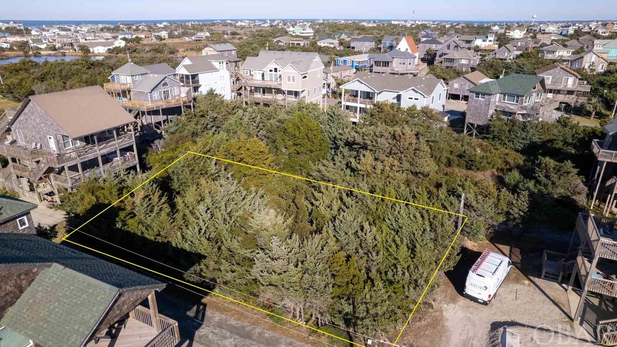 Great opportunity to be tucked in off of Woodall Way and close to the Ocean in South Hatteras. Just a short walk or golfcart ride to Marinas, restaurants and ramp 55.