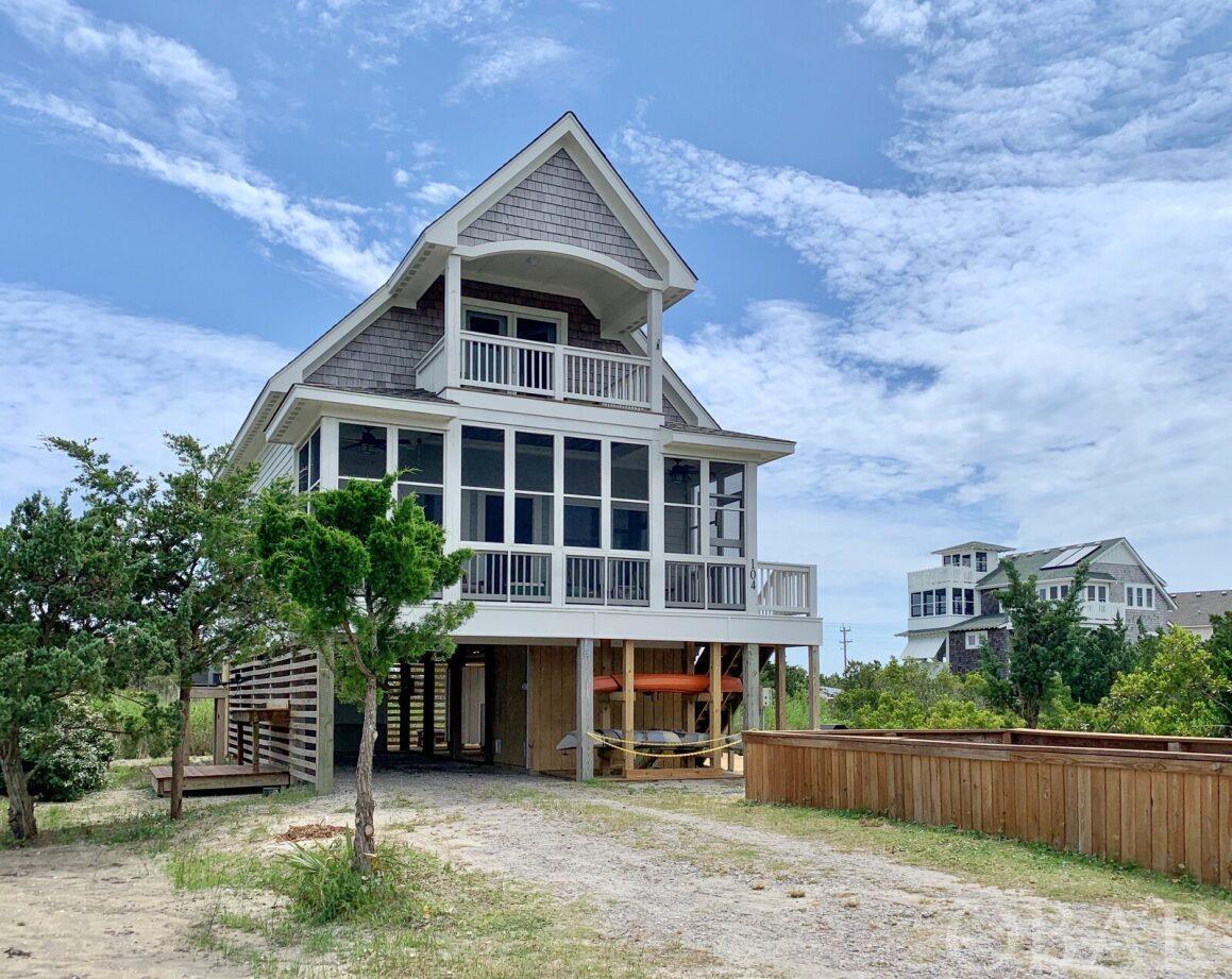 Discover the beauty and tranquility of Ocracoke! "Adicus House" is a 3 bedroom/2.5 bath home built in 2016. This coastal cottage is located in the Pamlico Point subdivision with breathtaking long range views of the salt marsh, national park land, our local pride and joy "the ball field" and a distant sound. Truly inspirational! Quality craftmanship; granite countertops, stainless steel appliances, 9' ceilings, beautiful hardwood floors (downstairs), central heat/ac, ceiling fans, open kitchen/living/dining area with views, kitchen island with granite top, first floor owner suite and Jack and Jill bedrooms upstairs. The interior is painted with coastal colors and several rooms have a custom painted beach accent wall. Sip a glass of coffee or wine while relaxing or birdwatching on the front screened porch. There is another first level screened porch off the back facing South Point Road. One of the upstairs bedrooms has access to a covered porch with spectacular views! Exterior amenities include a ground floor furnished deck, bike rack, outdoor shower, storage shed and fish cleaning bench. Adicus House is currently a vacation rental home but can easily transition to a year round residence. Proven rental history!