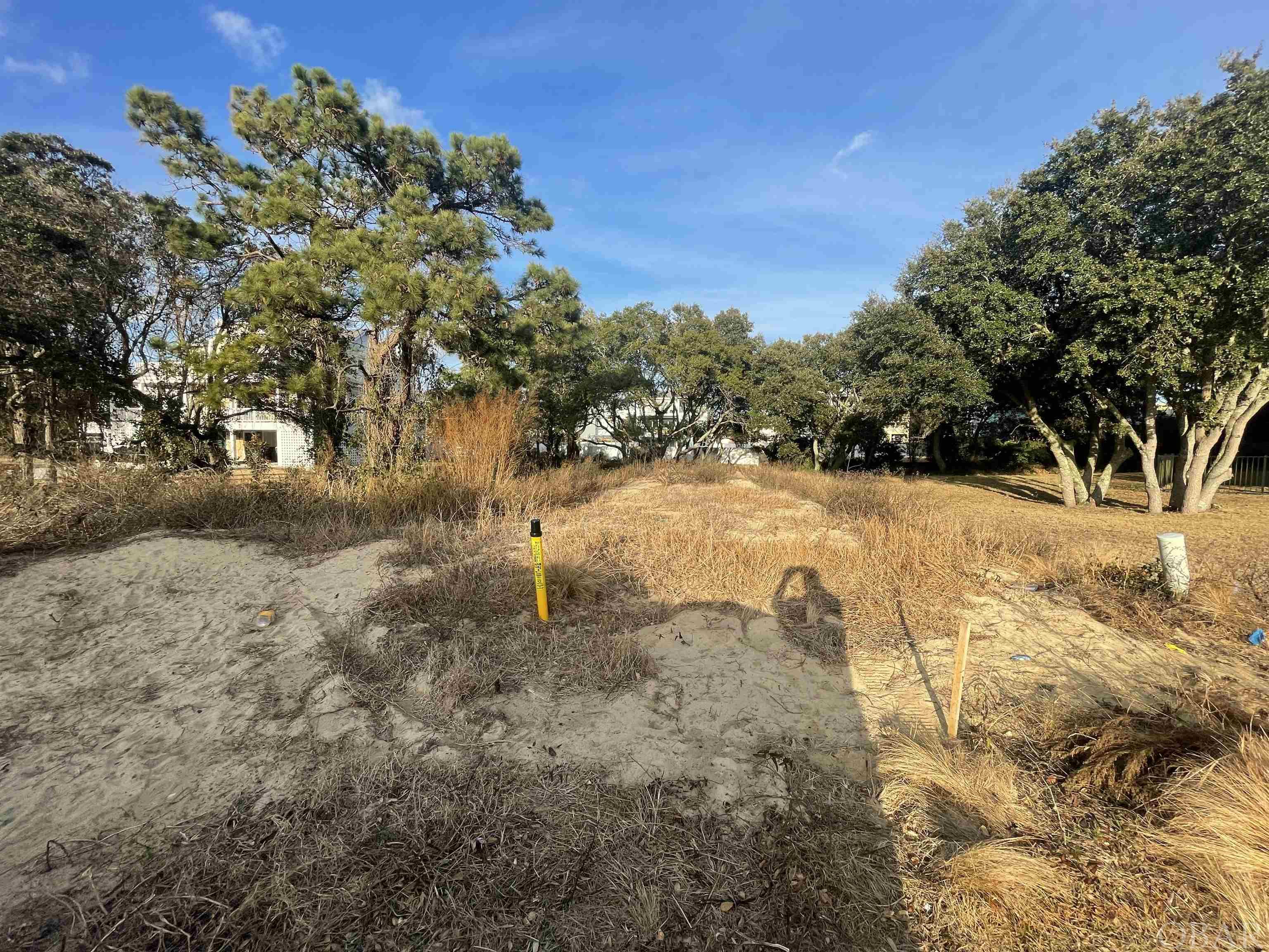 A great opportunity to own one of the few remaining lots in First Flight Ridge a upscale private gated community in the heart of Kitty Hawk. Located within walking distance of the restaurants, shopping and the beach this lot is situated on a culdasac and can offer soundviews depending on home elevation while still being in a X-Flood zone.