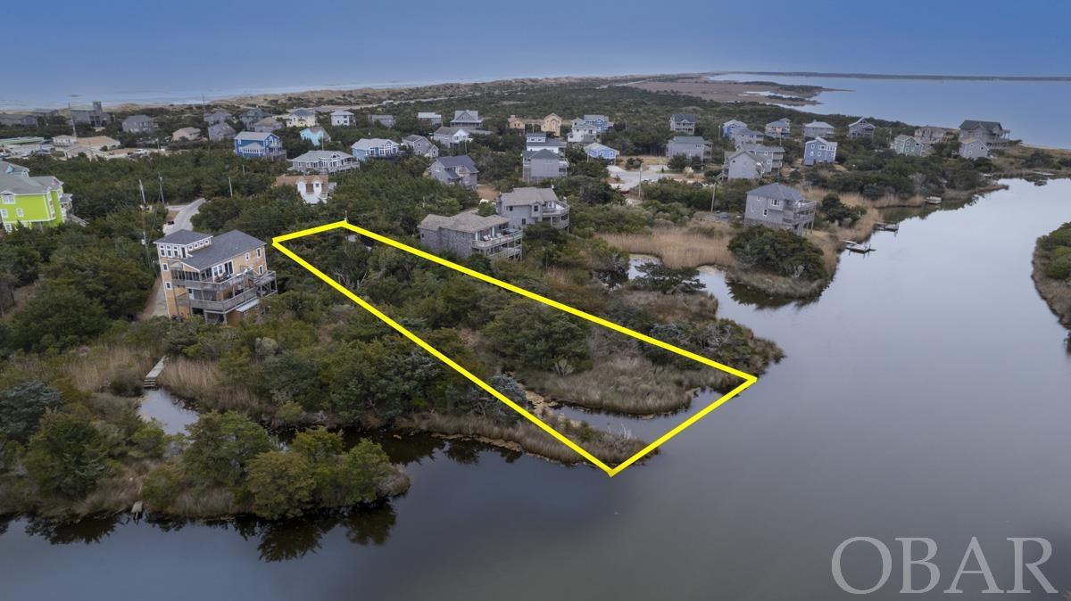 This property is located in south Avon, walking distance to Beach Access Ramp 38 of Cape Hatteras National Seashore. It is in a quiet, lush waterfront setting. This 0.43 acreage lot is one of the last in Avon with a water view! The sellers have a survey and a proposed site plan and are completing the CAMA and Improvement Permits for up to a 5-bedroom home with a pool.