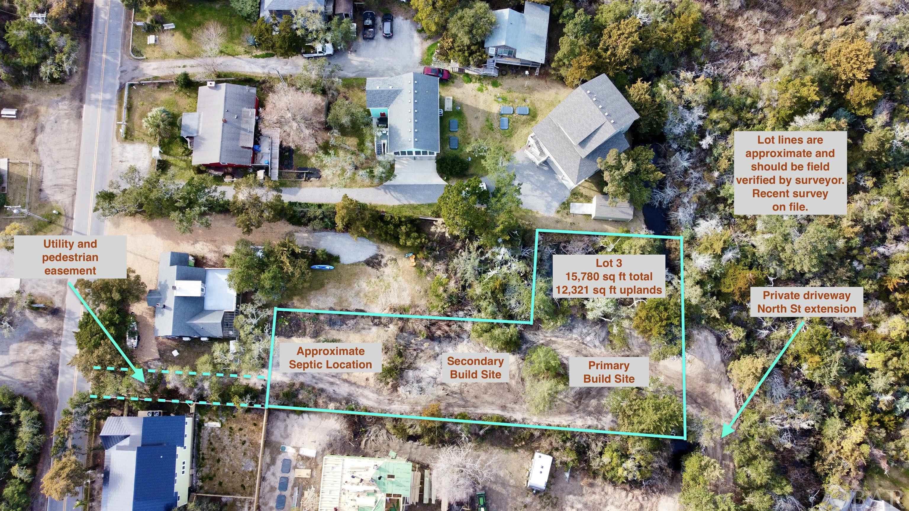 Large building lot in the heart of the village, close to all the happenings of Back Rd. Nature abounds this ready to build parcel with adjacent salt marsh and minimal neighbors attracting flora and fauna. Over 15,000 square feet provides plenty of space to build your dream home around the existing majestic live oaks. Permitted for 5 bedrooms! New owner could spread out bedroom allotment across multiple homes on this lot. Build a home for yourself and a detached mother-in-law suite or vacation rental. Includes a utility and pedestrian easement from Back Rd. Access to property is through North St. extension. Survey and 5 bedroom septic permit on file. Property contains 12,321 sq ft of buildable uplands and 2,807 sq ft of 404 and CAMA wetlands. Come build your dream!