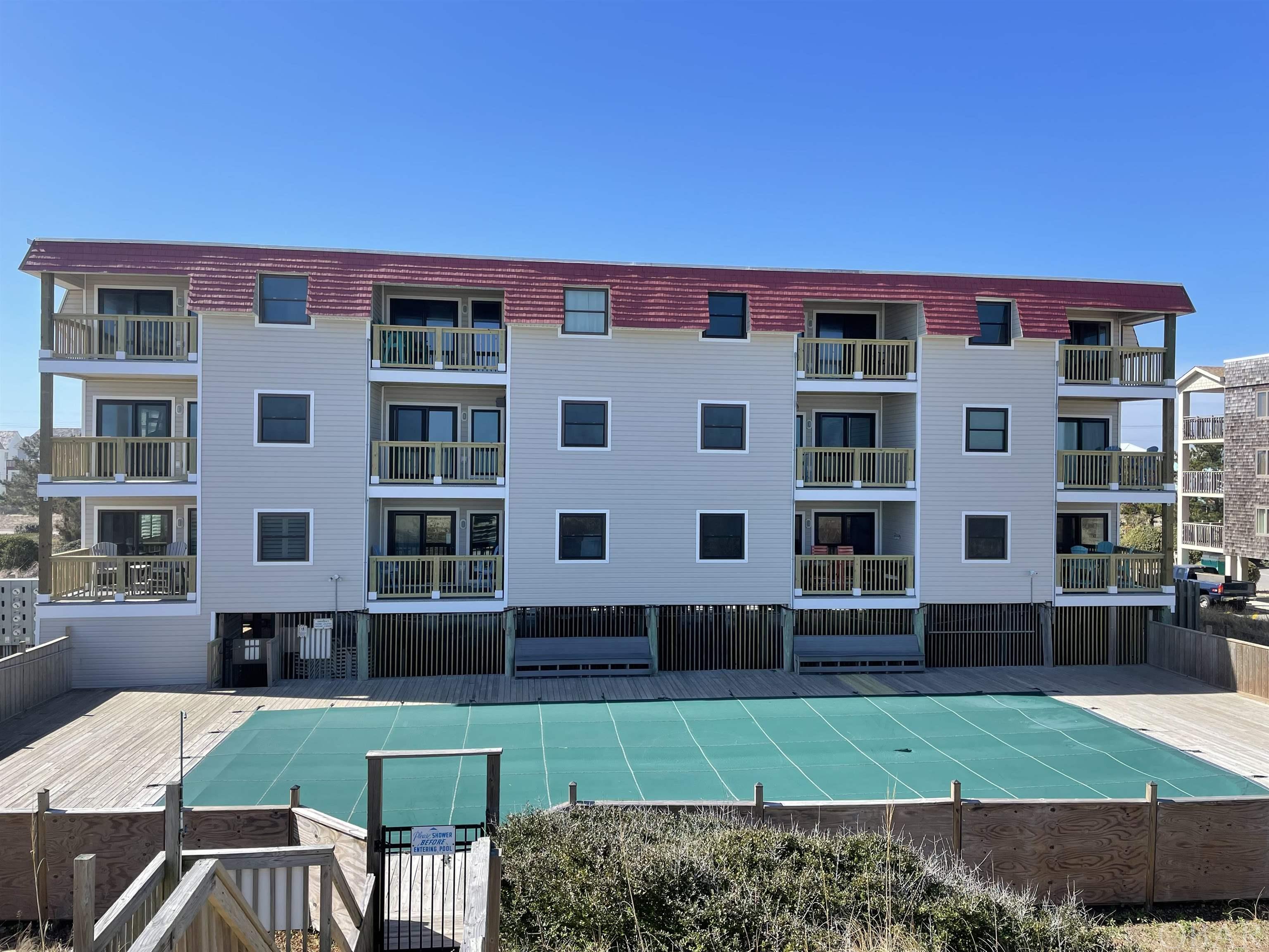 If you ever dreamed of owning an oceanfront property on the Outer Banks, this is your chance. And you don’t have to be a millionaire to do it! This bright, comfortable condo can be yours. It is ready for you and your family to enjoy. You can start a new chapter in your life, leave the hustle and bustle behind and discover all the treasures that the OBX has to offer. This can be your happy place, really – free of worries, filled with beach days, surfing, watching the sunrise over the Atlantic Ocean and so much more. This unit is perfect for somebody looking for a low maintenance, updated and well-maintained place. You don’t have to do anything here – the flooring has been replaced, popcorn ceilings scrapped, windows and sliders were also replaced (see a complete list of updates). Even some of the furniture is brand new. The condo building was also recently updated with all new decks and siding on the east side and it offers an elevator for those who don’t want to carry their suitcases and groceries. This condo has not been in a rental program, but it can easily be turned into a vacation rental home (and your investment home - rental projection for $53,527!). Nags Head is the place to be when it comes to a perfect vacation spot. It offers numerous attractions including the tallest living sand dune in the eastern Unites States - Jockey’s Ridge, Jennette’s Pier, lots of great restaurants (Blue Moon, Owen’s, Sugar Creek – just to name a few), lots of shops and miles of beautiful beaches for you to explore.