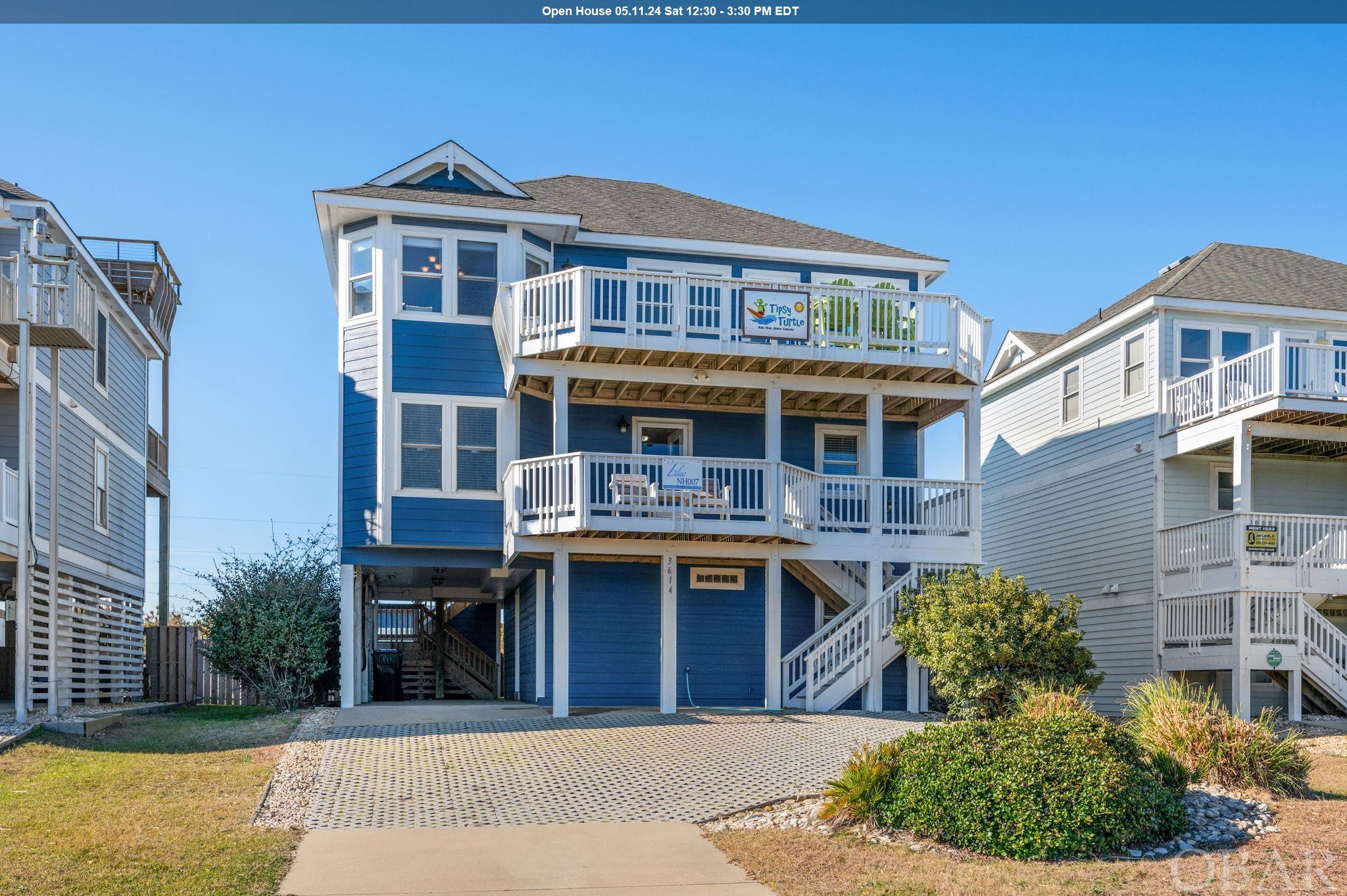 We're super excited to present this semi-oceanfront gem in the heart of Nags Head! Not only has it undergone loads of recent stylish updates and major improvements, just wait till you explore the fantastic layout of this tri-level 5 bedroom, 4 full-bath beauty that's situated less than 600 ft from the sandy shores of the Atlantic Ocean. Panoramic sunrise and sunset views are both yours for the asking! New Cali Longboard Vinyl waterproof flooring (2022) graces the top level living area with an airy, beachy vibe and open-concept design, perfect for large family gatherings. The kitchen is well appointed with stainless steel appliances and shiny new (2023) granite counter tops. You'll also find a spacious welcoming master en suite on this level, as well as an open deck to sunbathe, enjoy the sunrise and catch the salty breezes. On the mid-level are three more bedrooms (one with a private bath), a full hall bath, laundry area, plus a super comfy bonus den complete with wet bar, mini fridge, TV and access to an open oceanside deck with a new 6-person hot tub to languish in after spending a long day at the beach. There's also a covered deck on the soundside to relax and unwind while taking in a beautiful Outer Banks sunset. On the ground level is a bunk room, full bath and a rec room outfitted with a pool table, refrigerator as well as a card/board game table and access to the outdoor pool and living area which includes a volleyball court, grilling (both gas and charcoal) spot and convenient outdoor shower. Each level of this home is designed specifically for you and your guests to either gather together or spread out. The Nags Head multi-use path is practically right at your doorstep, inviting short walks to Nags Head Pier, great restaurants and shopping and Jockey's Ridge State Park. So many attractions are close by! Set up your showing now to tour this perfect beach retreat and enjoy classic OBX living!-See Brokers Notes for full list of improvements. Copy and paste to browser for virtual tour https://unbranded.youriguide.com/3614_s_virginia_dare_trail_nags_head_nc/