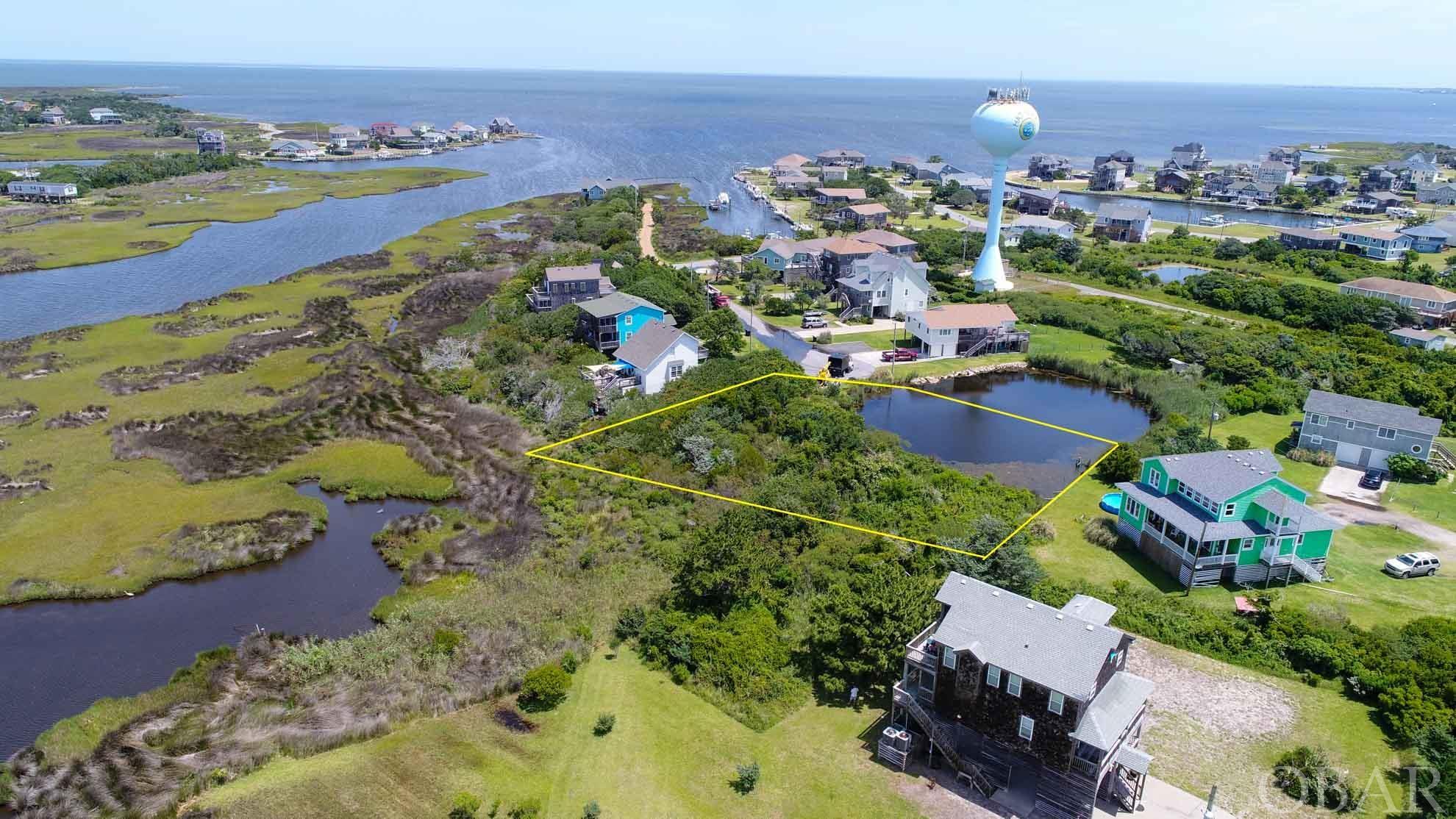 Great opportunity to secure a building lot in Hatteras Estates with ocean access and HOA boat dockage subject to availability. 2 BR septic permit in hand ready to build with complete set of engineered house plans for a 2 story 1152sqft residence.