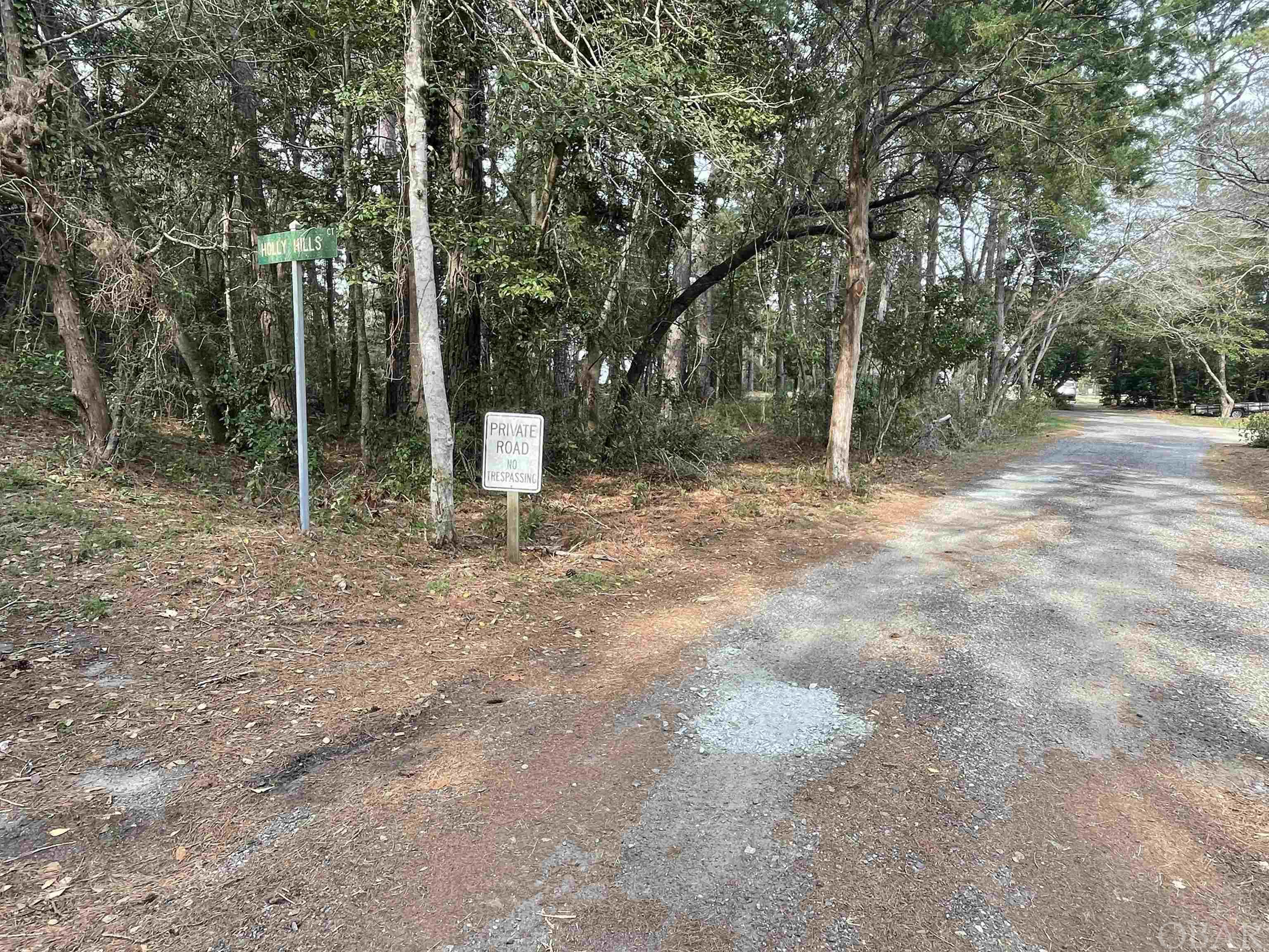 This lot is a gem! A wonderful homesite on one of the highest properties on Roanoke Island. It is located in a peaceful quiet neighborhood with few houses and lots of trees, and a short walk or bike ride to all three schools in town.