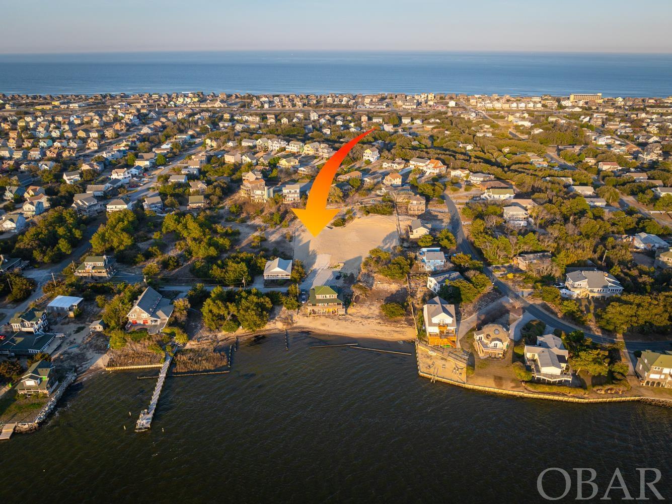 Large semi-sound front lot! One of the few rare vacant semi sound front lots left in Nags Head! This property has already been cleared, filled and graded and is ready for your dream home featuring breath taking sound views!