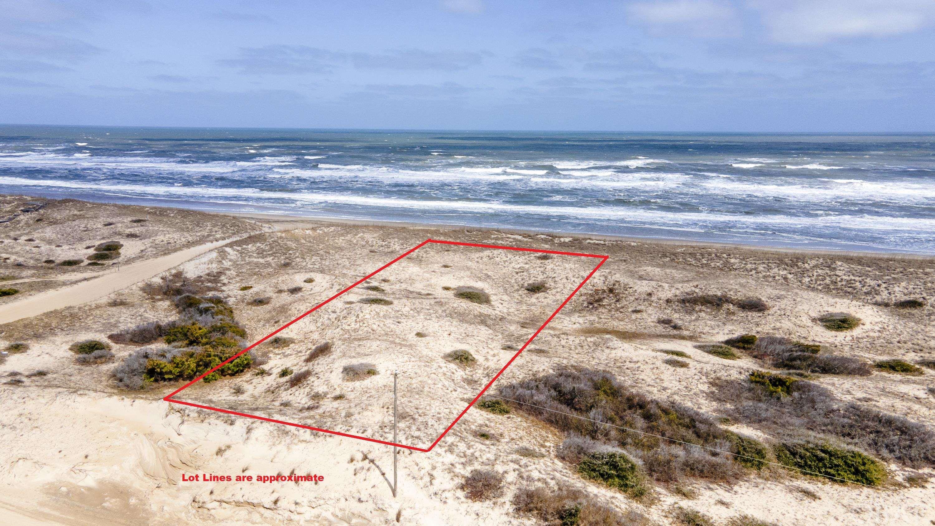 Not your typical Carova oceanfront lot!  Located in the Estates at Carova Beach, this property is 124 feet wide, much wider than the size of the conventional 80' lot.  With a combination of unobstructed views and great elevation, there is a lot of flexibility as to what size house you could build on this oversized lot.   Plenty of room to build a home in the preferred “X-Flood Zone,” which means no flood insurance would be required.  The south side of the property has a 30 foot easement that gives you even more of a buffer zone from your neighbor.  Ask listing agent for sample rental projections for different size homes.