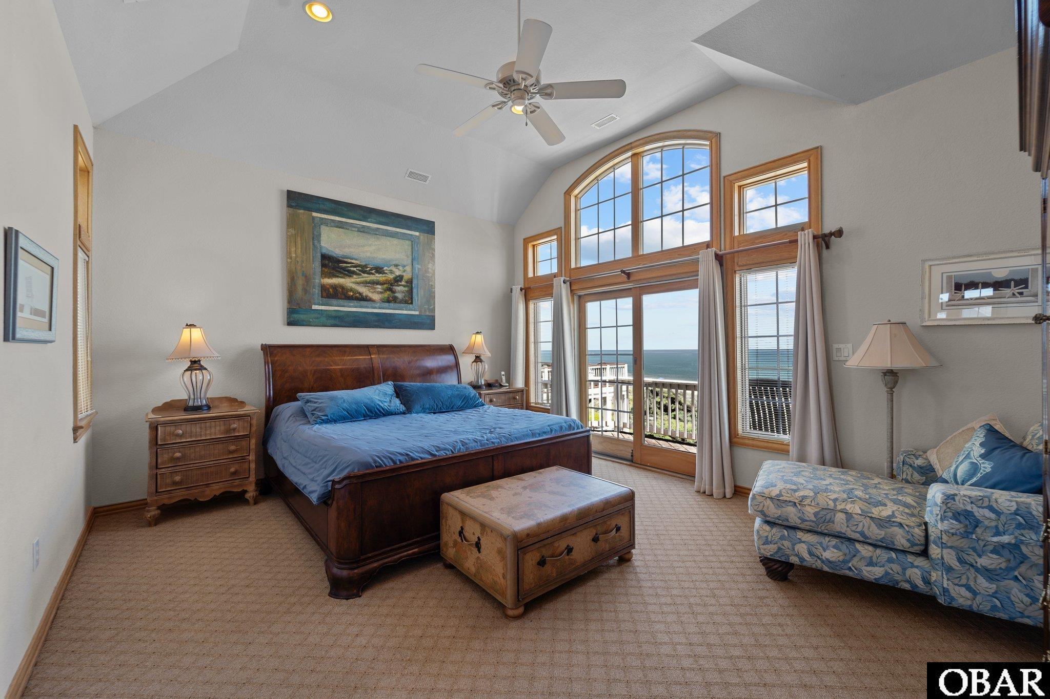Top level primary bedroom with ocean views