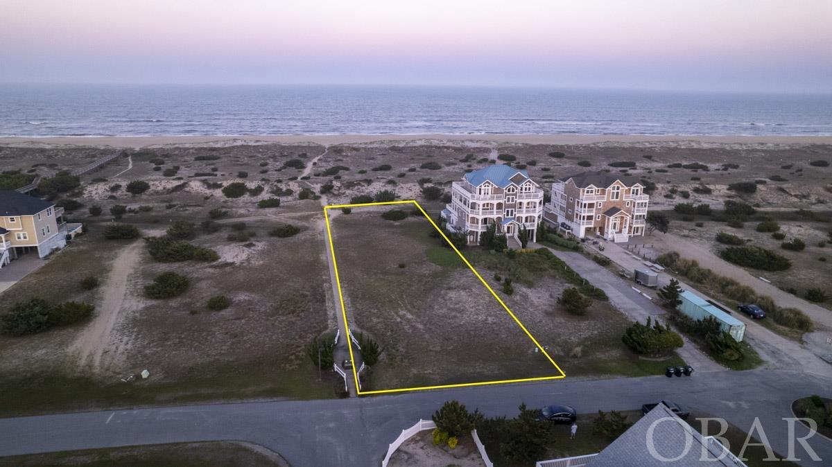 Absolutely the best oceanfront lot available on Hatteras Island! This South Beach Gem boasts elevation, location & is 3 lots from National Park Service expansive miles of separation Salvo form Avon.