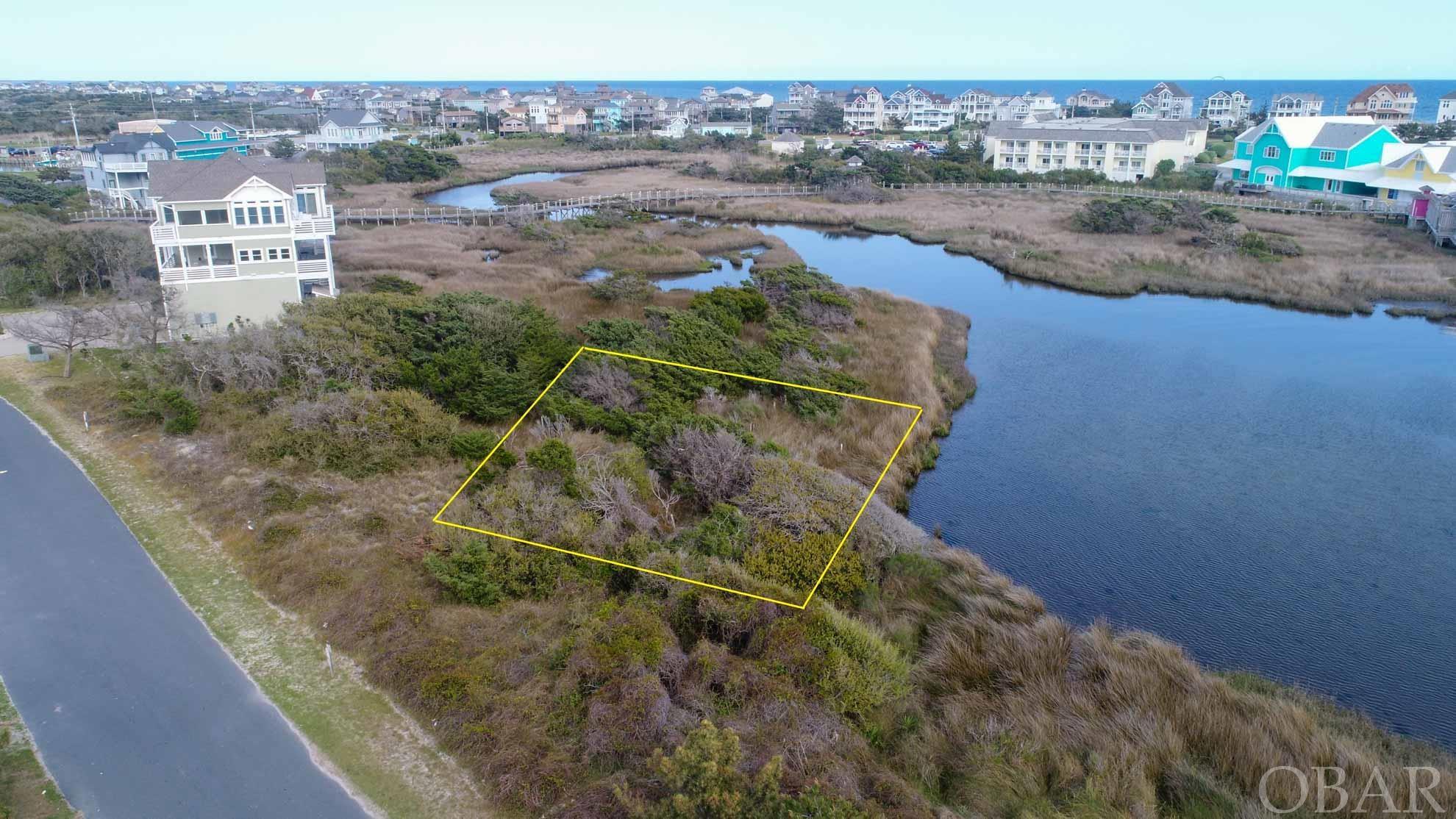 Enjoy life in South Hatteras! Great opportunity to secure a building lot in Hatteras Landing. This is a most see!