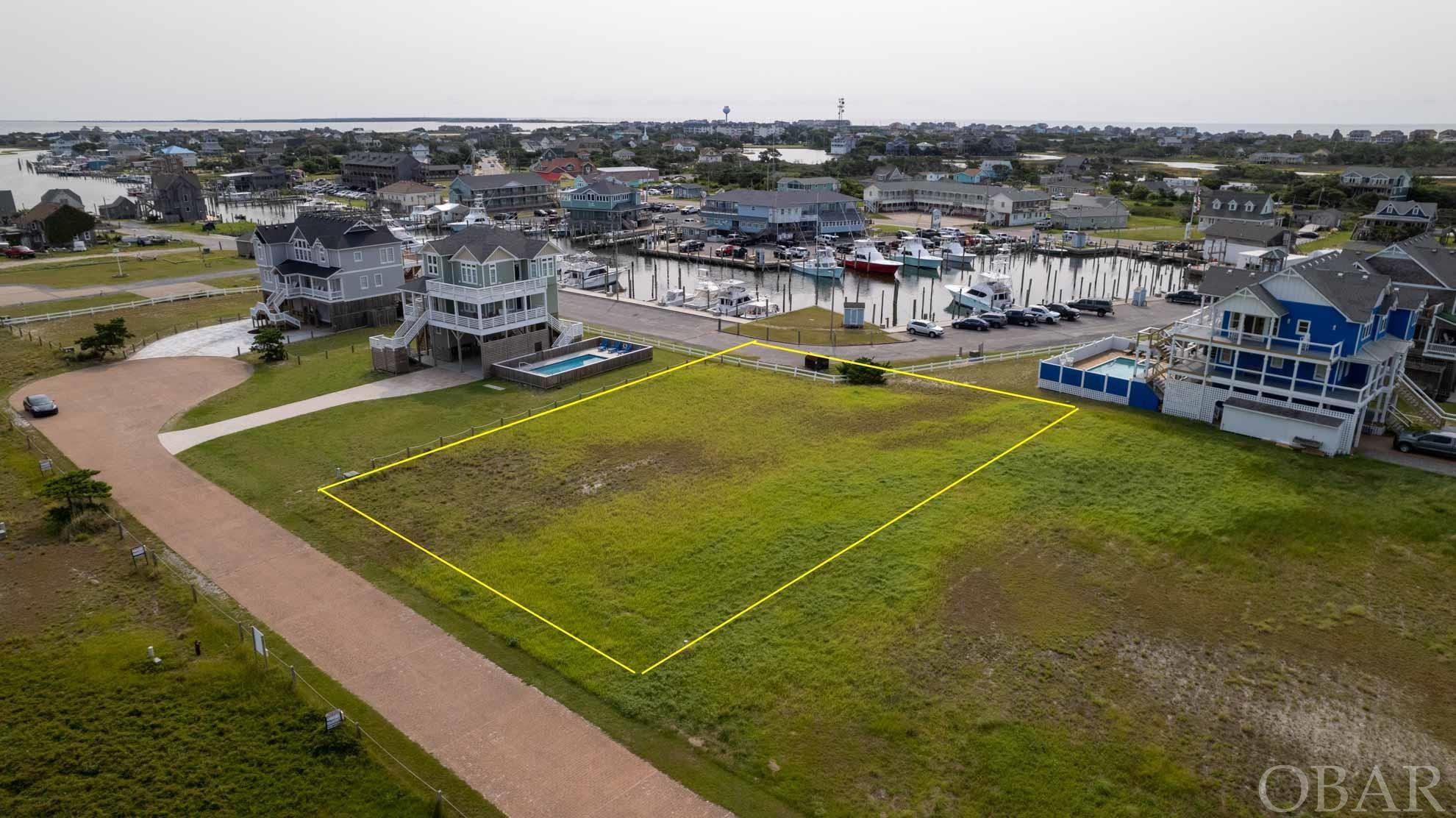 Amazing semi soundfront in Hatteras Harbor Subdivision with views of Pamlico sound and Hatteras Harbor Marina & Village Marina. Secure this building lot today!