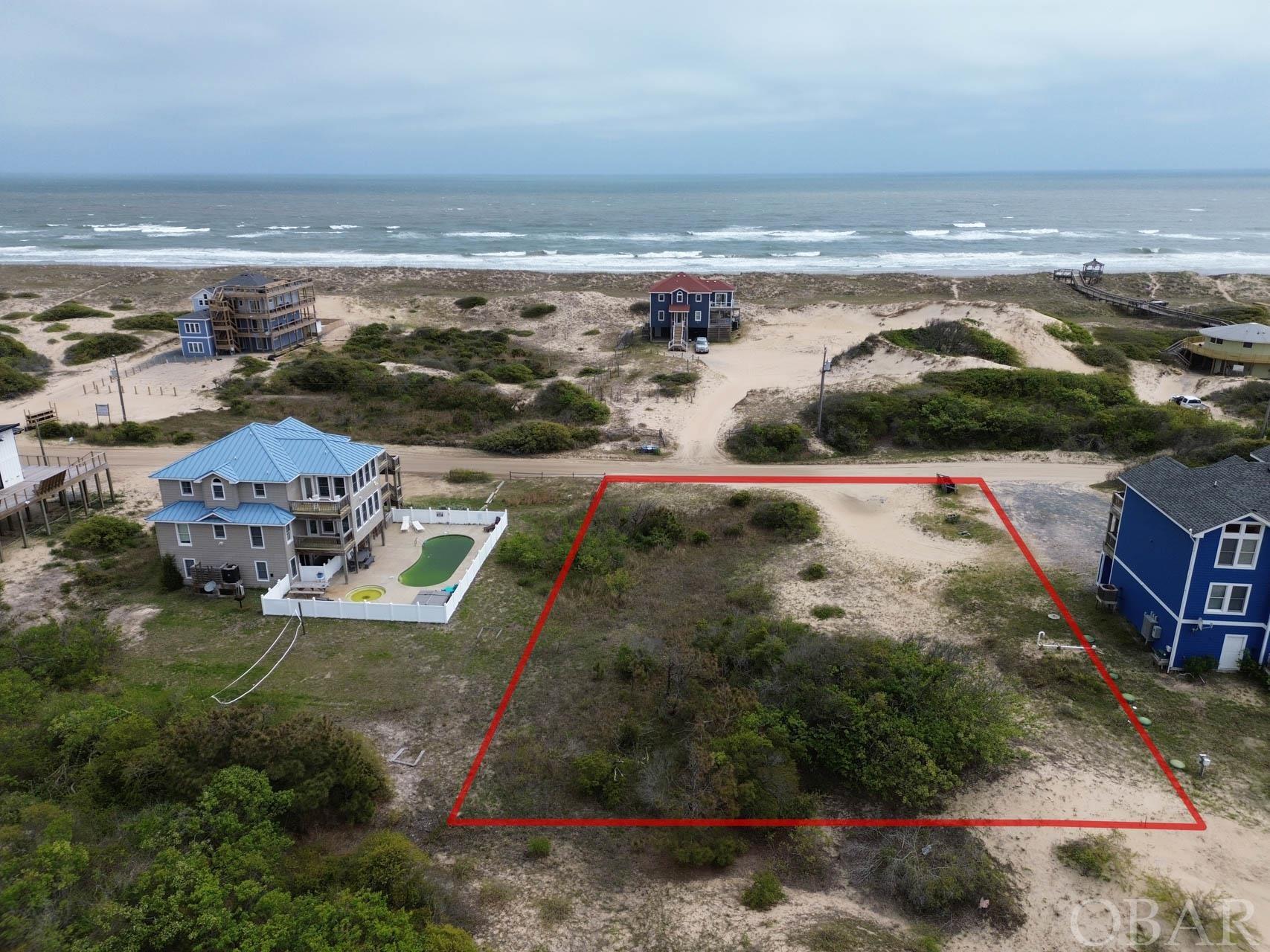 Build your dream home on this remarkable Semi-Oceanfront lot with great elevation. Easy access to the beach! Ocean Views from a two story home should be very nice, plus easy access to the beach! Survey, Soil Report and Site Evaluation are available - All that's left to do is build the home of your dreams! Located in the x flood zone, this would make an ideal location for your future second home or vacation rental property. Very stable and thick frontal dunes, east access to the beach, and great potential views! This lot is a must see in Carova Beach, the 4-wheel drive section of Corolla.