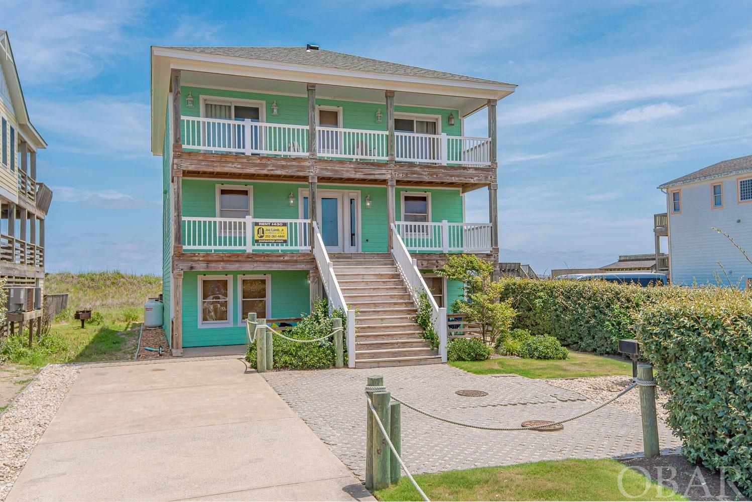 Who is ready for summer? Why not start yours as the new owner of an oceanfront 8 bedroom, 6.5 bathroom house in desirable Nags Head! This property checks some important boxes such as having an elevator, game room, pool and beautiful ocean views. Maintaining their investment, sellers had a fortified roof put on. Serving meals to a crowd? No worries, this kitchen is equipped with two ovens and two dishwashers. Eating out of course is an option with the Nags Head Pier (0.2 mi) miles away, and Lucky 12 (0.3 mi). Sweet tooth in the crowd? Surfin' Spoon is (0.1 mi) away! There are of course, additional restaurant options as well. After a fun day of surf and sun, come back to the house and enjoy the pool with its' all new decking and fence completed In April, 2024. Of course it has an elevator!Come check out this property before summer passes you by!