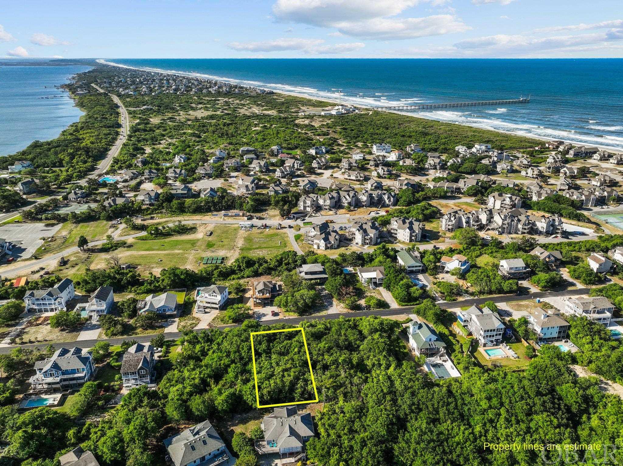 Oceanside lot in-town of Duck with ACCESS! Rare opportunity to build a custom home on a high elevation lot on Olde Duck Road. It is located in an X flood zone which means NO flood insurance required! This homesite has so much to offer! A short walk takes you to, the ocean, waterfront shops, the sound-front board walk, water sport rentals, restaurants and so much more! Call for more information on this fabulous lot in the heart of Duck!