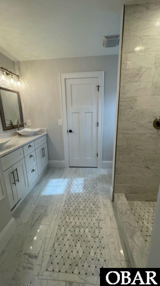 Primary Bathroom with Quarz counters and Marble Shower/Floors