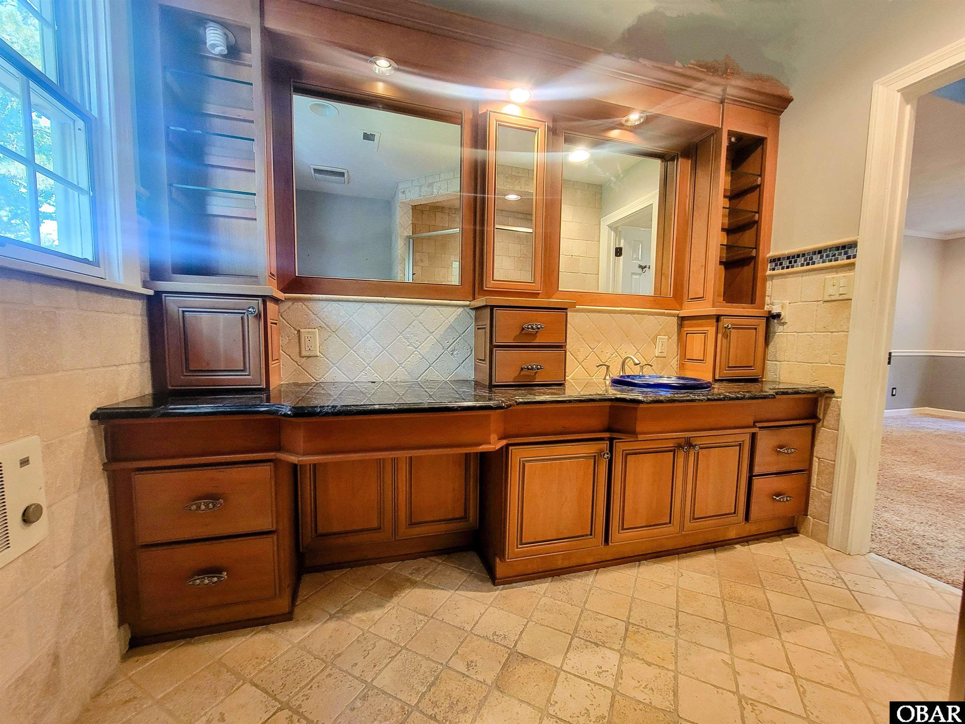 w/ Custom Cabinetry & Vanity area
