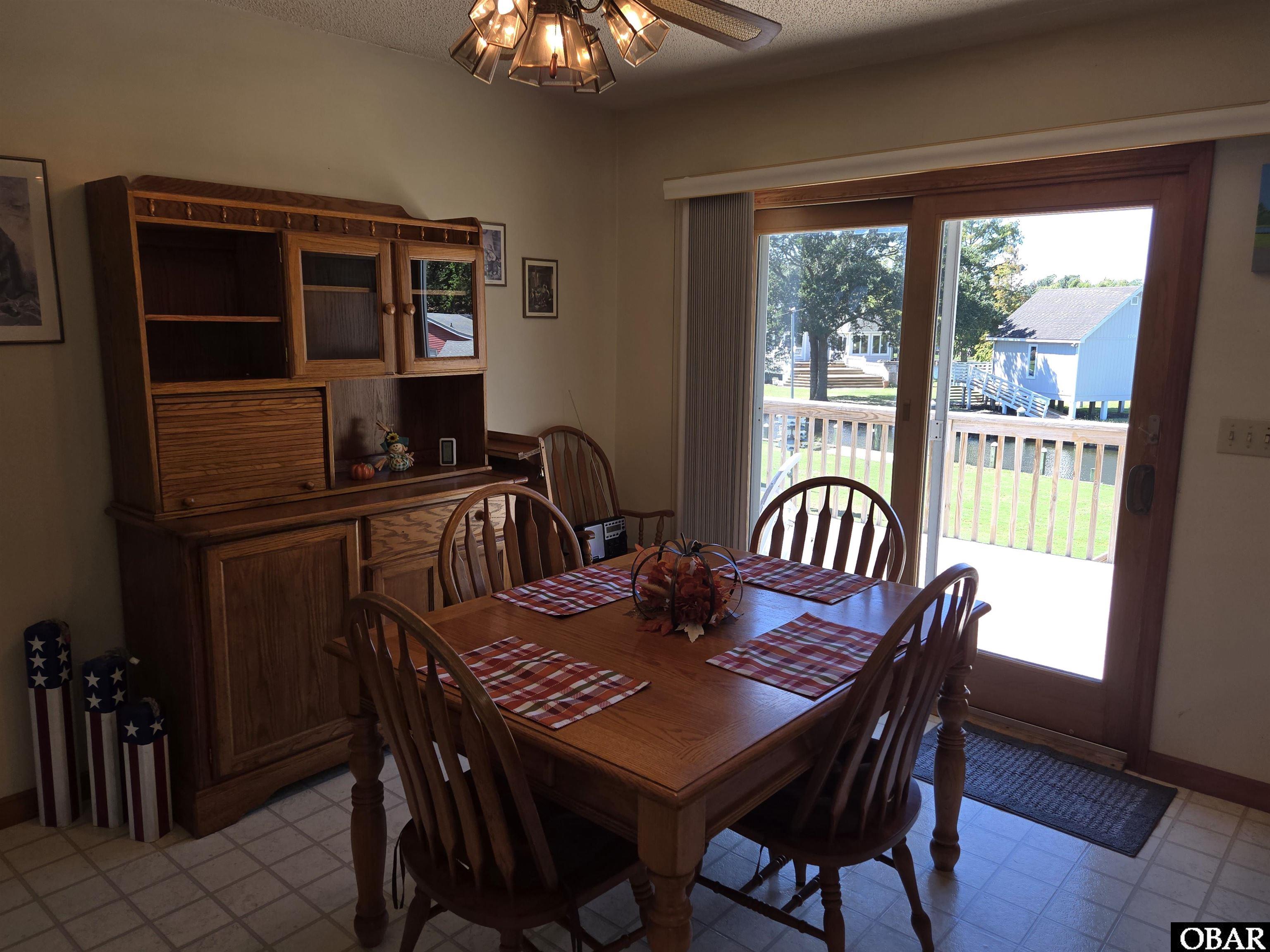 Dining Table, Chairs & Hutch Conveys
