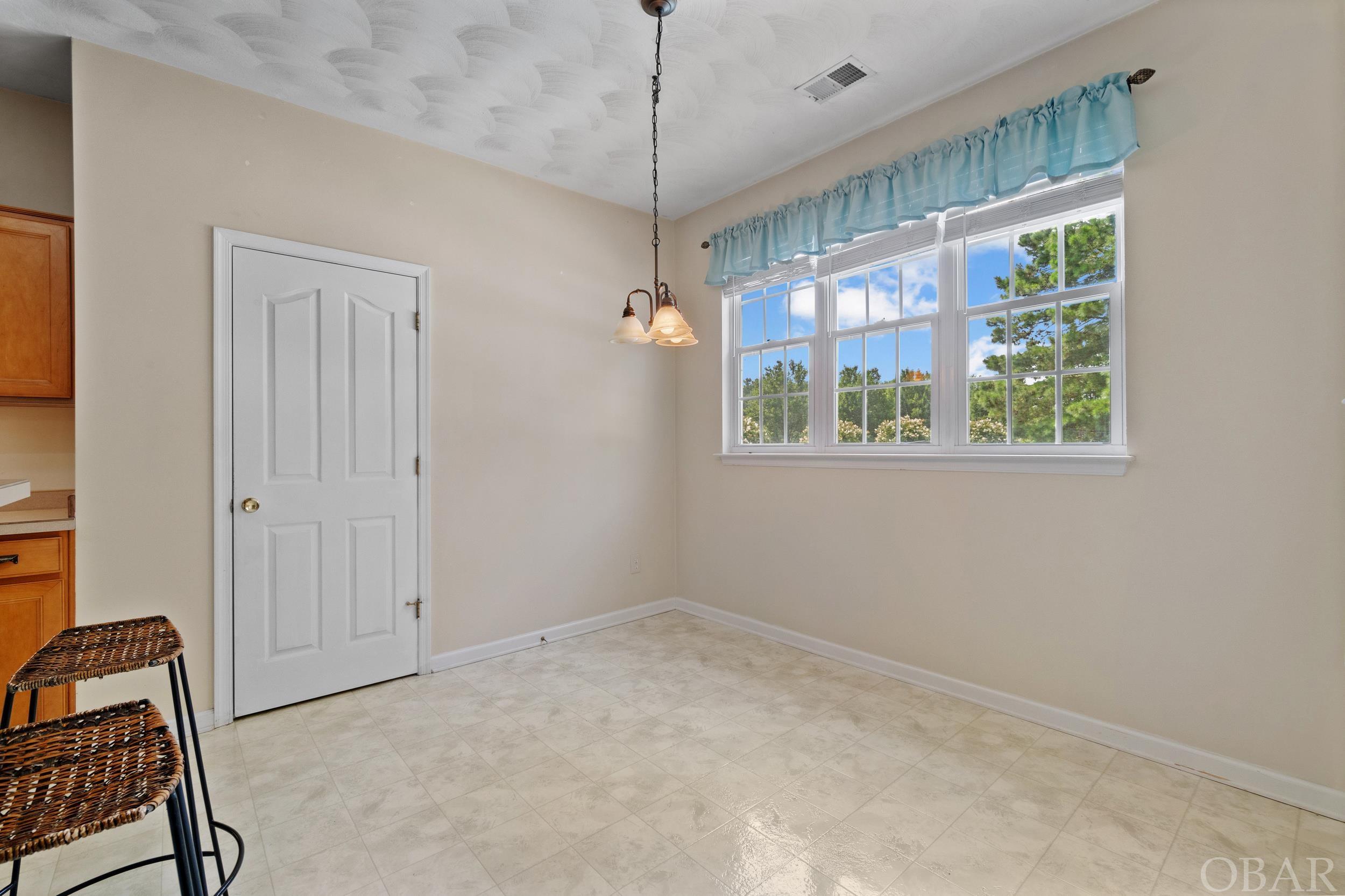 Kitchen breakfast nook with pantry