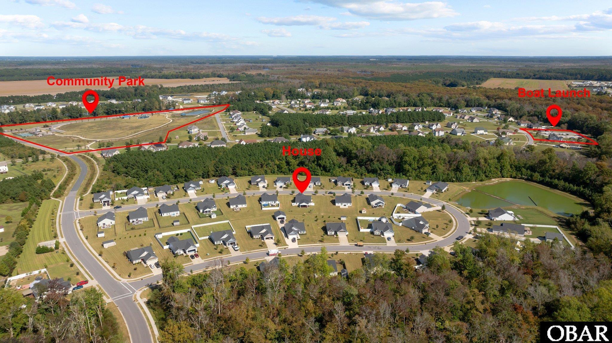 House in relation to the park & boat ramp