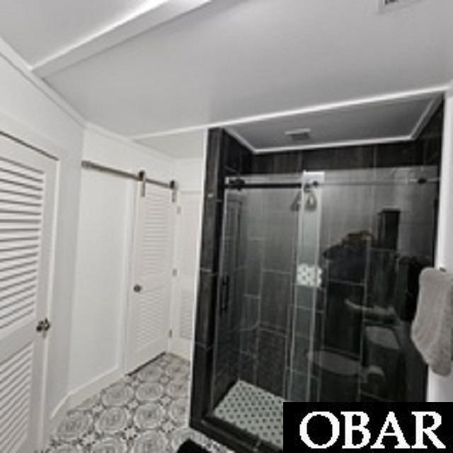Tiled shower attached to bedroom#3