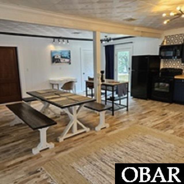 Open kitchen/dining/living area