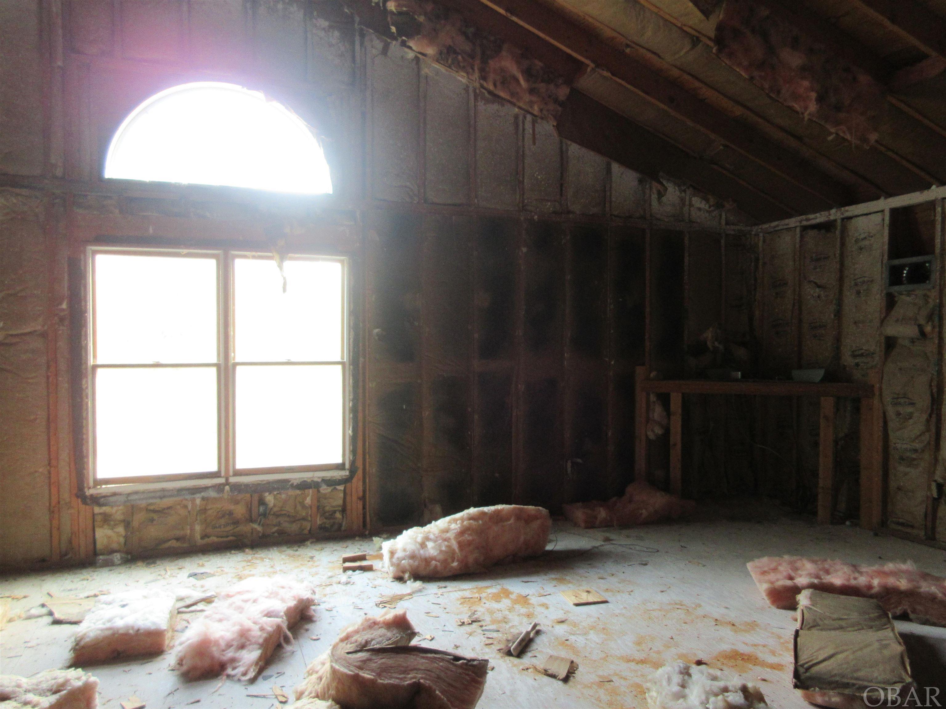 UNFINISHED ROOM OVER LARGE DOUBLE GARAGE