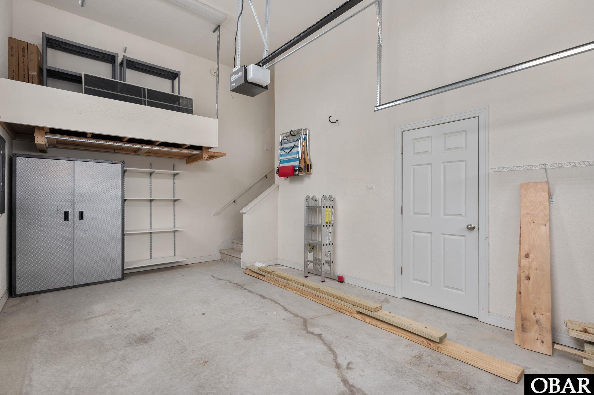Pullout platform connects to hallway for easy access to elevated storage.