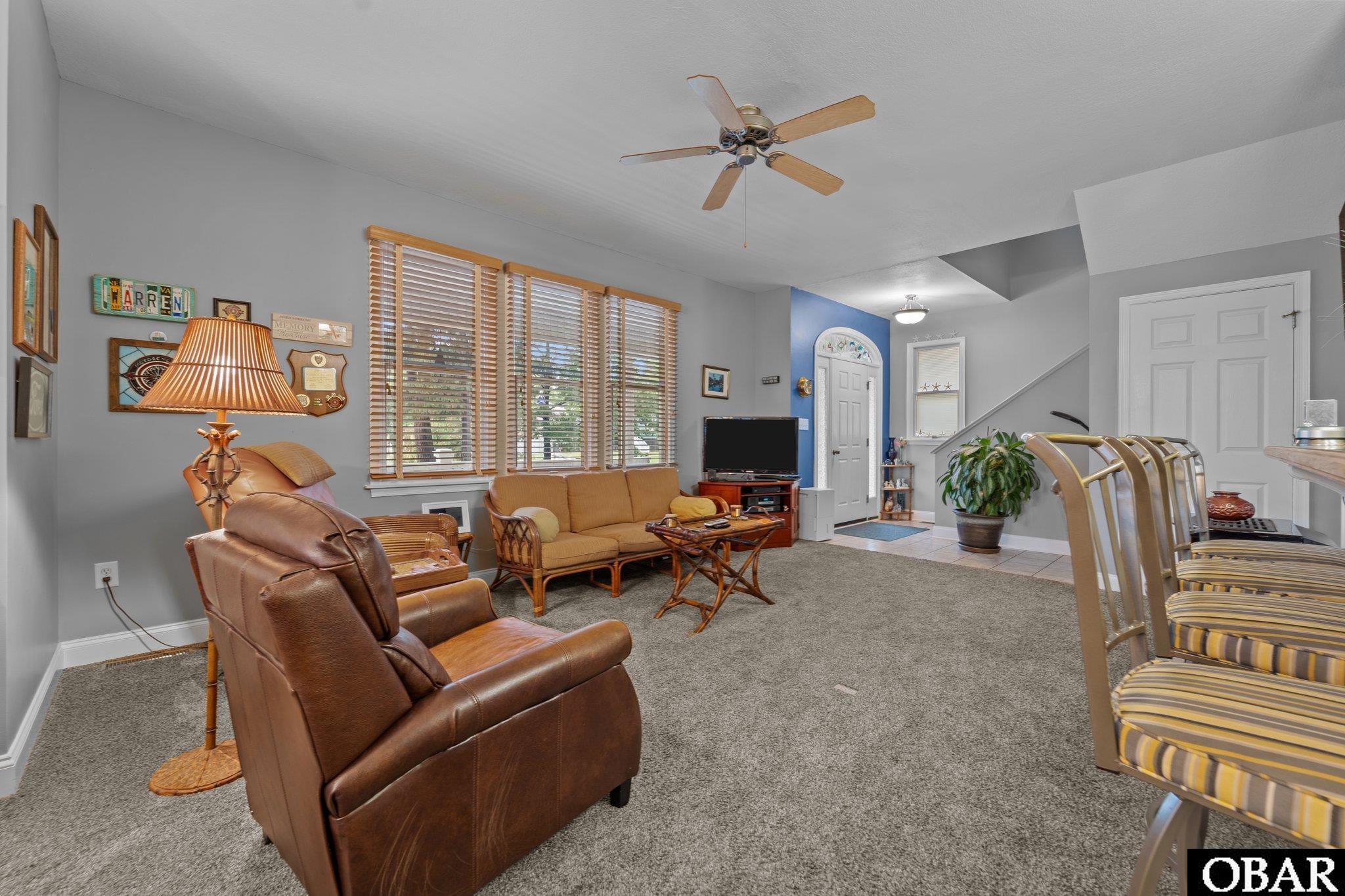 Living Room looking at front door and stairs