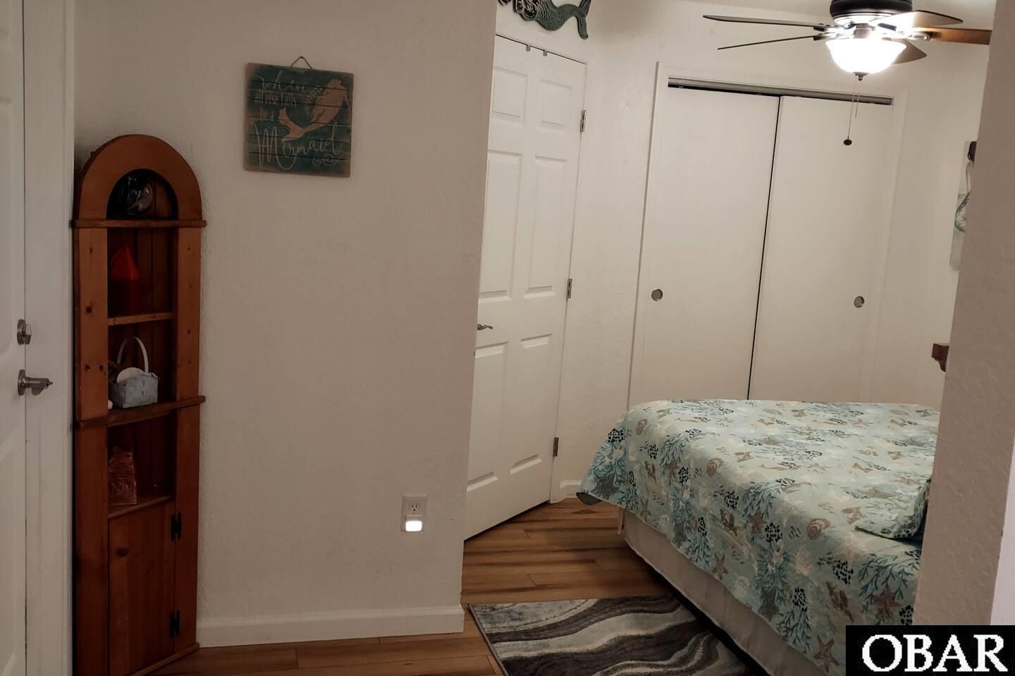 Downstairs bedroom with private bathroom