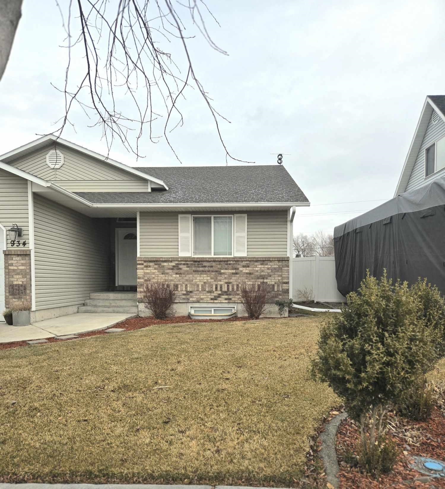 Discover the perfect blend of space, comfort, and convenience in this 6 bed, 3 bath home. Situated on a large corner lot, this property offers a 2-car garage, RV parking and extra storage, ideal for all your needs. The bright open layout includes a cozy family room, perfect for gatherings. Stay comfortable year-round with gas heat and central AC. Outside, enjoy a fenced yard with a fire pit, perfect for relaxing evenings, plus a shed for added storage.  Located close to a park, this home is perfect for outdoor fun.