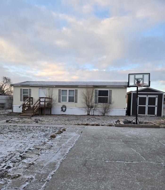 Remodeled home with newer carpet and updated appliances. 2 large sheds to store all your extra items. This move in ready home is just waiting for new owners. 1 year old furnace with built in condenser, ready for install of new ac unit. Great view of the sunsets and close to playground.
