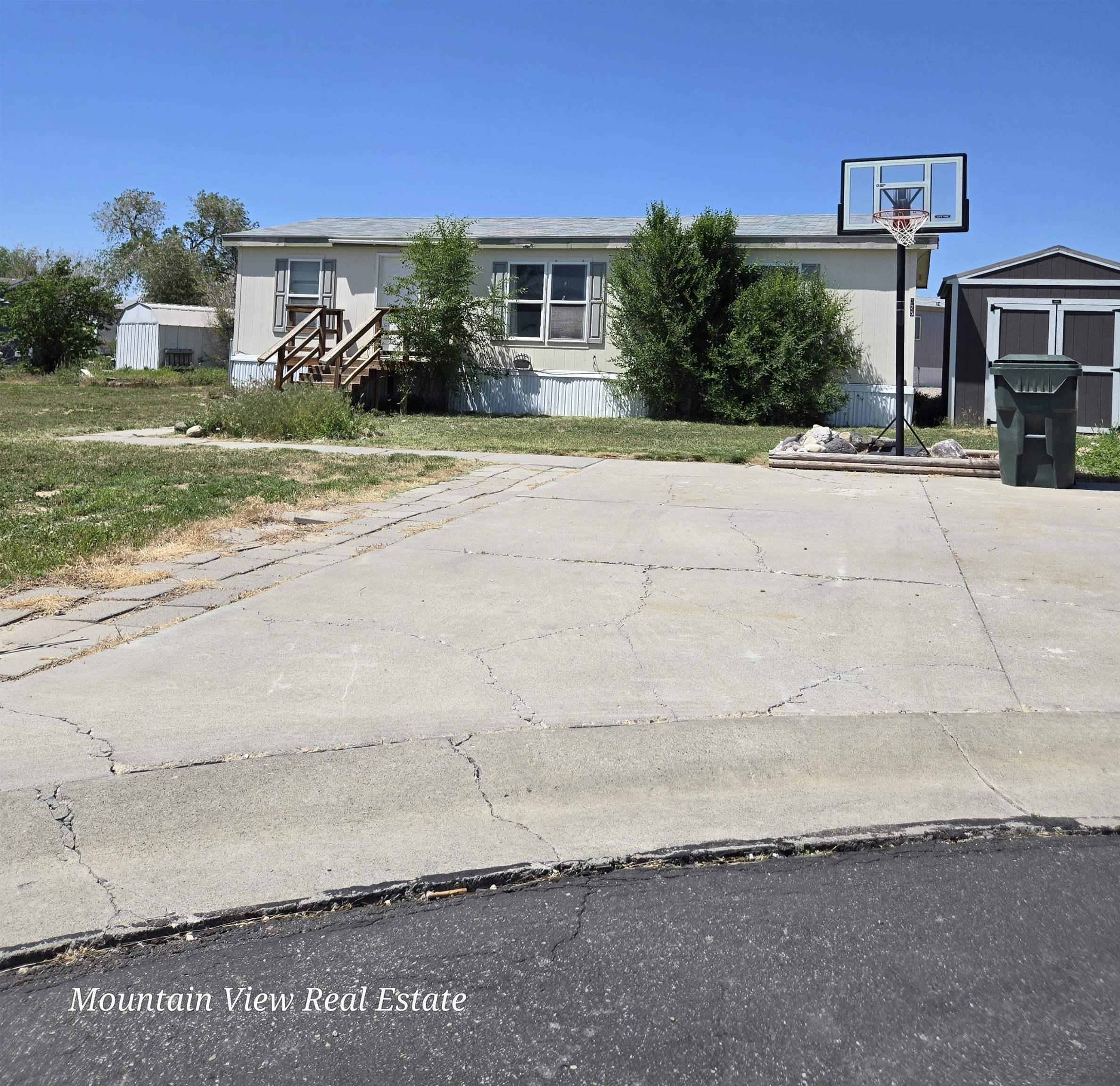 Remodeled home with new carpet and updated appliances. This home has 2 large sheds to store all your extra items. One year old furnace with built in condenser, ready for install of new ac unit. Great view of the sunsets and close to playground. Lot rent 495.  New owner must apply and be approved with the park.  Owner is willing to carry financing with a full price offer and 30% down payment.
