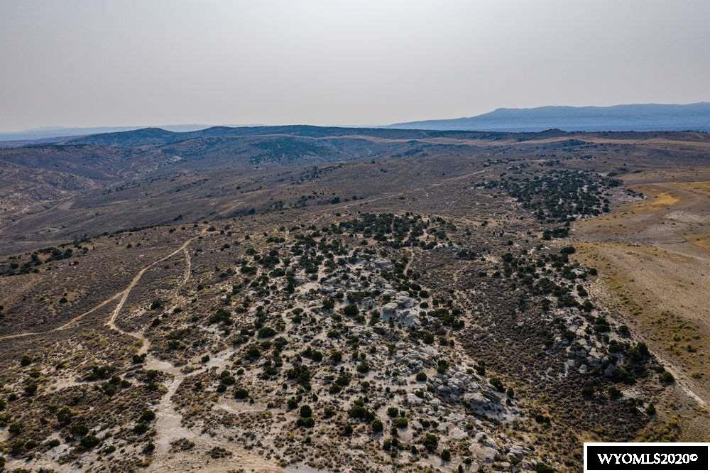 Half a section of land (320 acres) located south of Rock Springs. Beautiful views and landscape surround the entire area. Local habitat supports deer, antelope, occasional elk, and numerous birds of prey. Numerous possibilities exist for potential buyer.