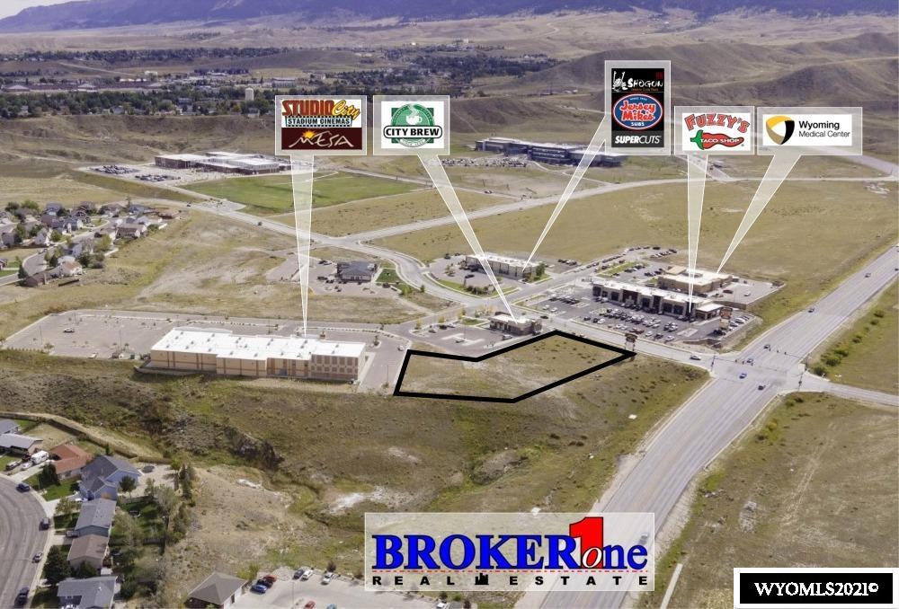 1.61 acres.  Fully developed and ready for vertical construction.  Directly across Talon from Fuzzy's Tacos and adjacent to City Brew Coffee and Studio City at Mesa 10-screen digital theater.  This parcel is located at the NE corner of Talon Drive and Wyoming Blvd, a signalized intersection. The Mesa, located in one of the most accessible parts of the city, is a 179-acre mixed use development.  Randall S. Hall and Michele Trost-Hall are shareholders of Seller, Mesa Development, Inc.